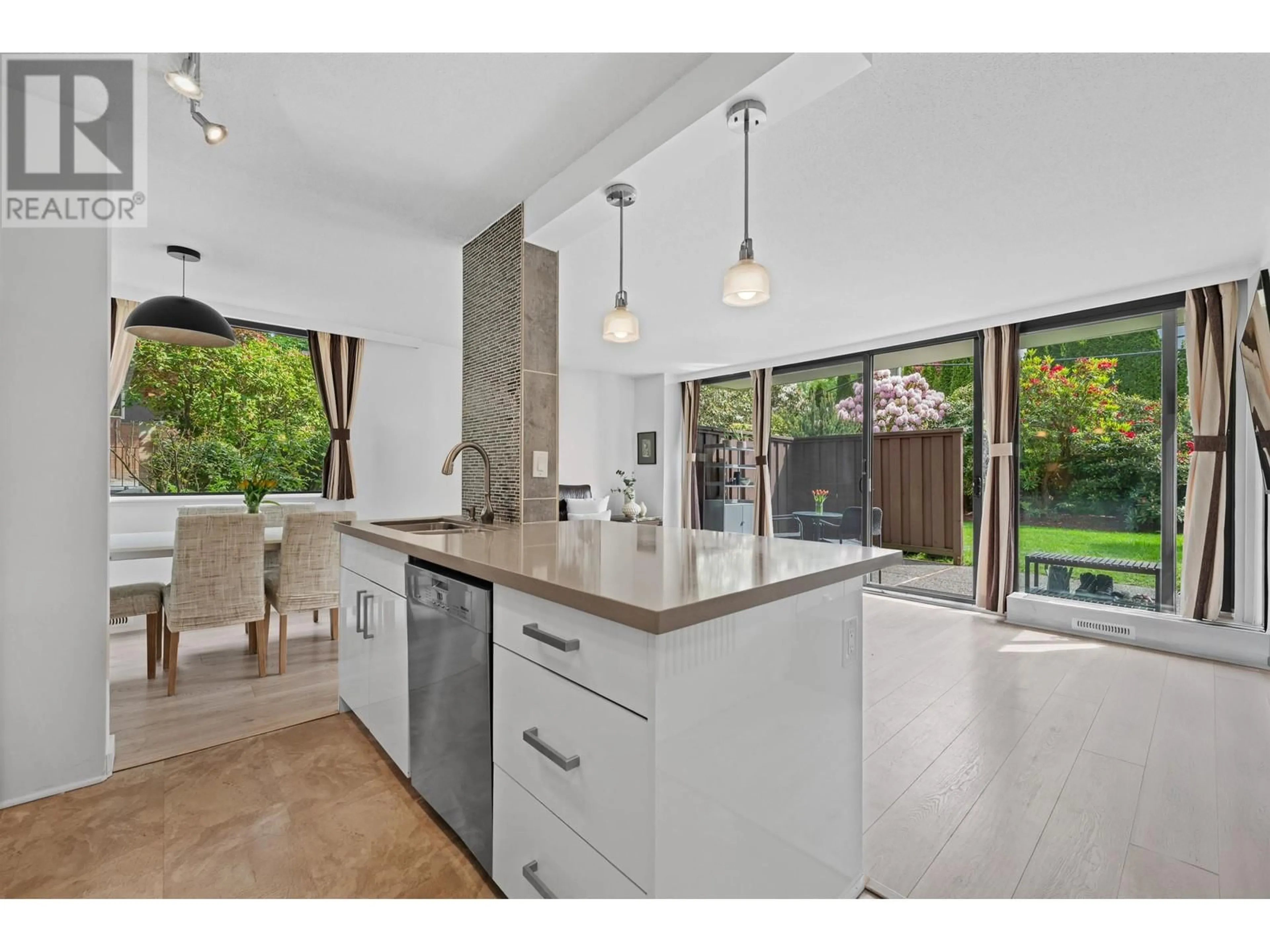 Open concept kitchen, ceramic/tile floor for 104 - 5350 BALSAM STREET, Vancouver British Columbia V6M4B4