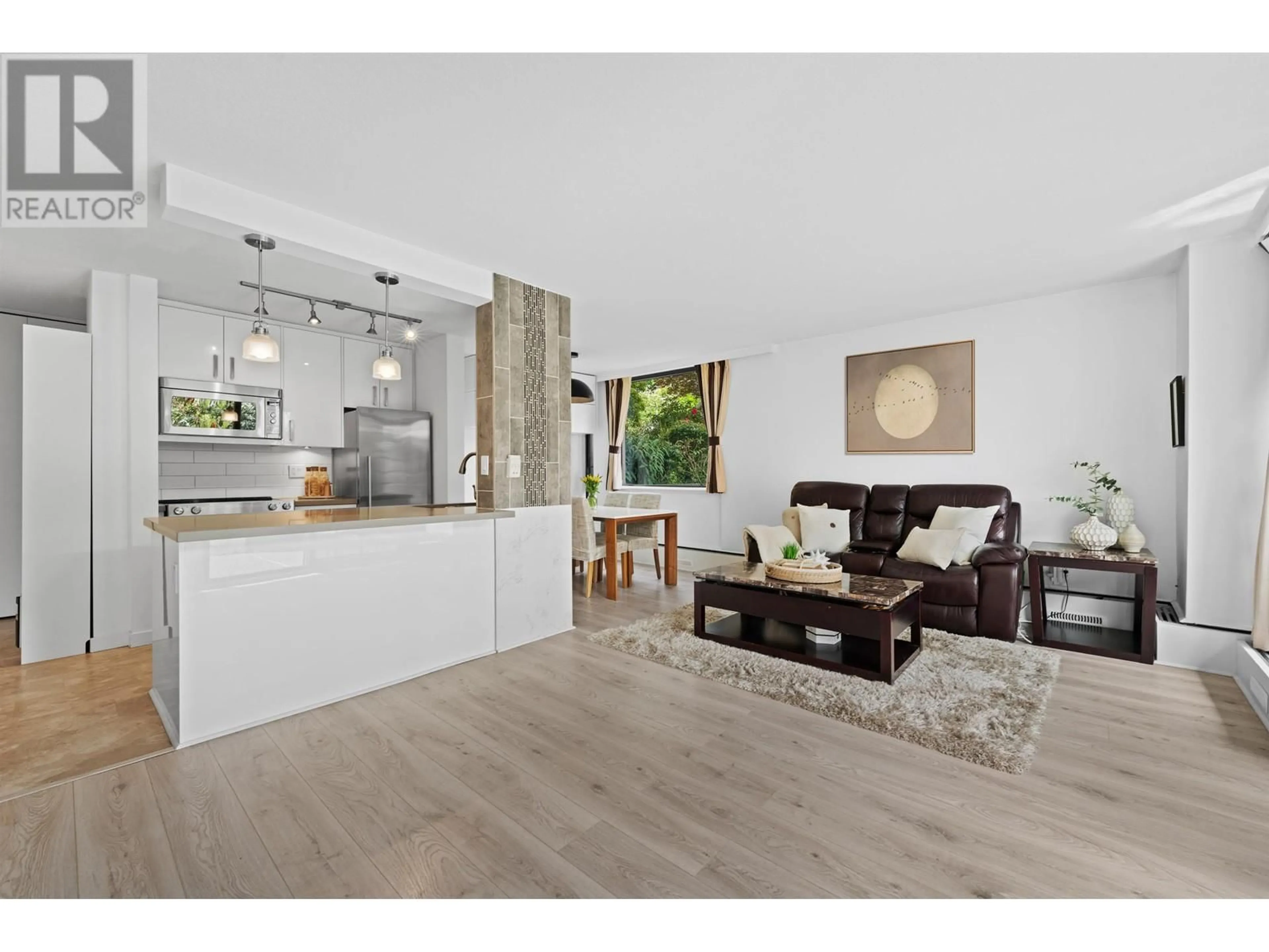 Open concept kitchen, wood/laminate floor for 104 - 5350 BALSAM STREET, Vancouver British Columbia V6M4B4