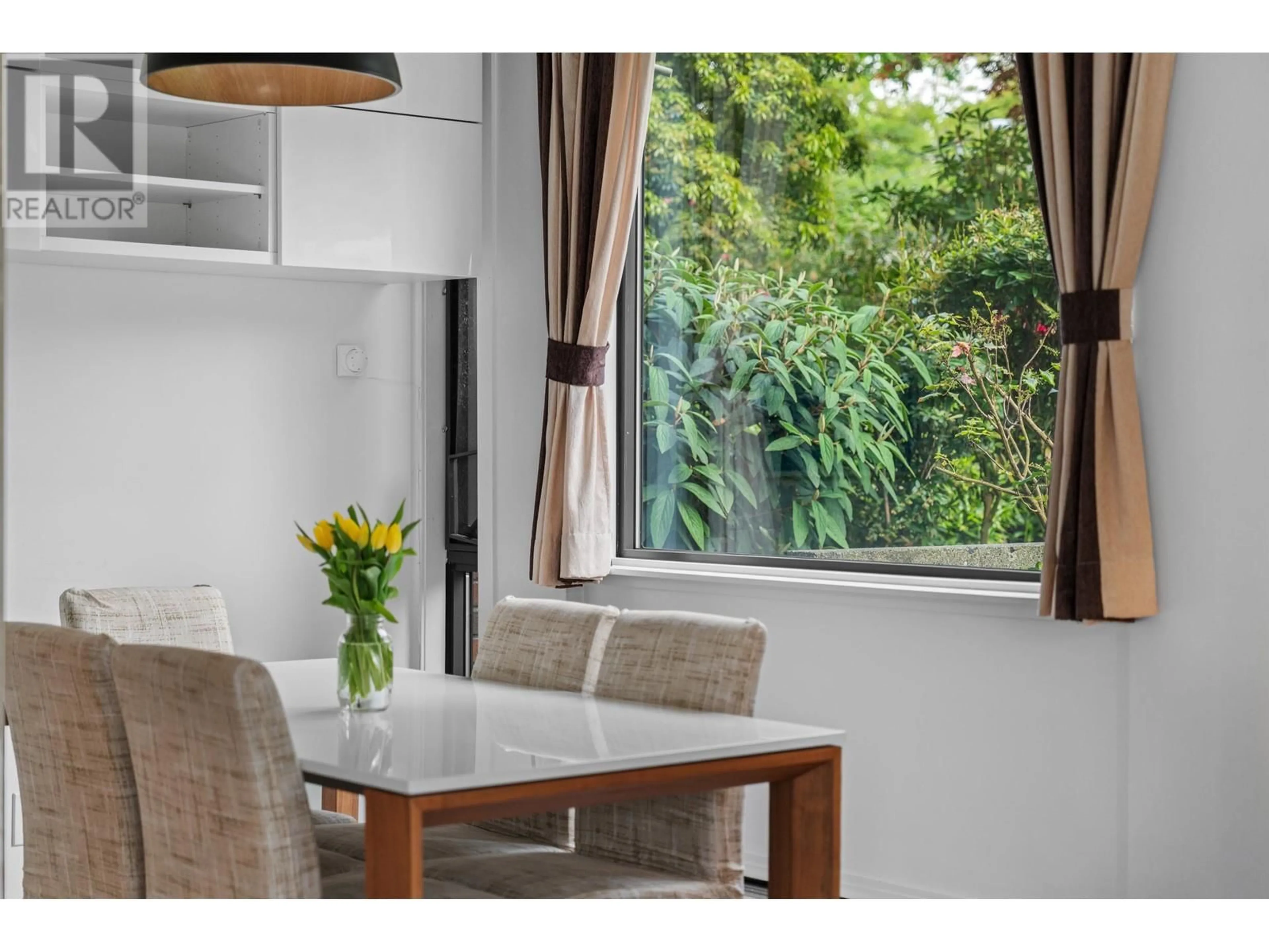 Dining room, wood/laminate floor for 104 - 5350 BALSAM STREET, Vancouver British Columbia V6M4B4