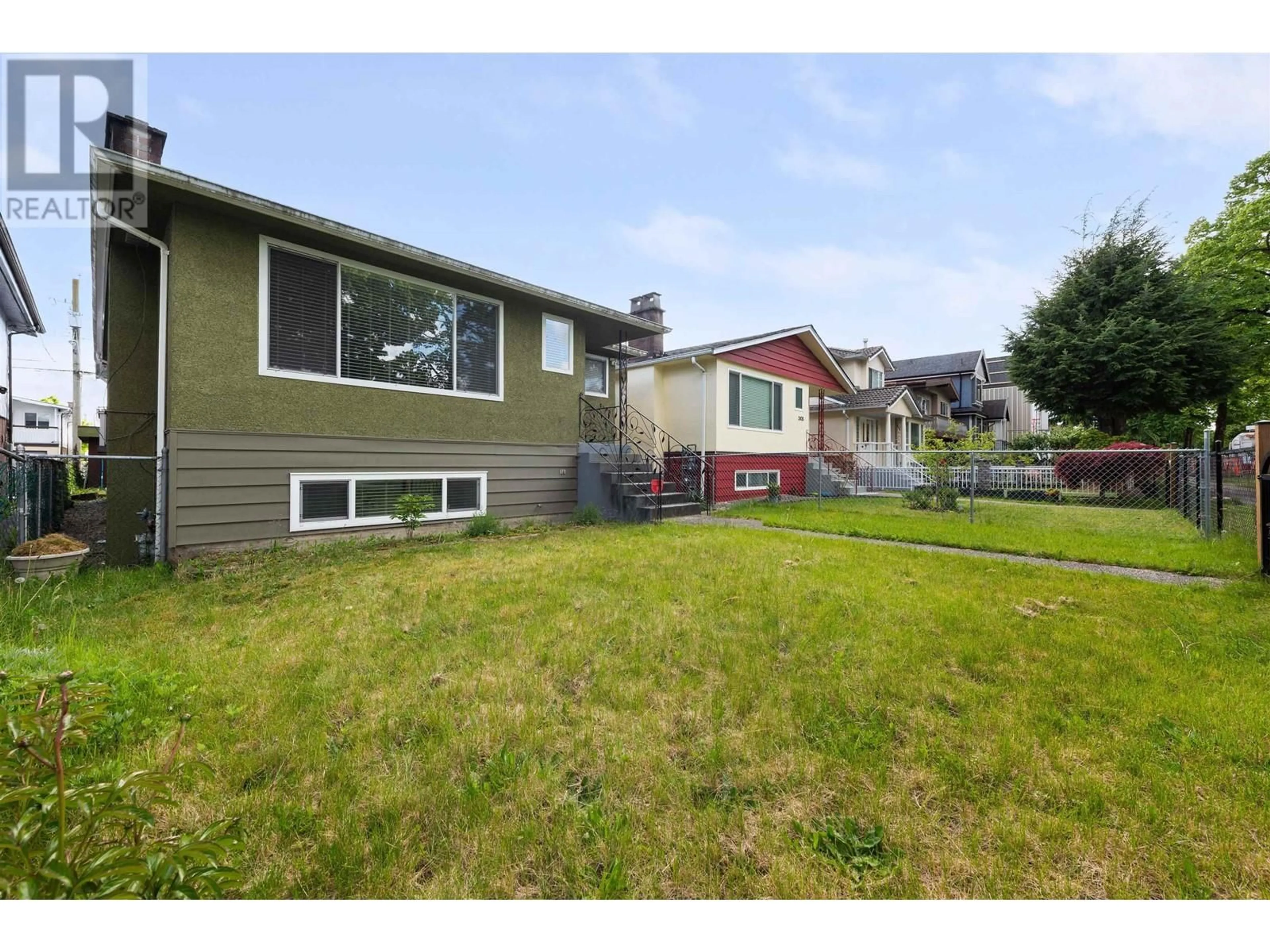 A pic from outside/outdoor area/front of a property/back of a property/a pic from drone, street for 2436 45TH AVENUE, Vancouver British Columbia V5R3B5