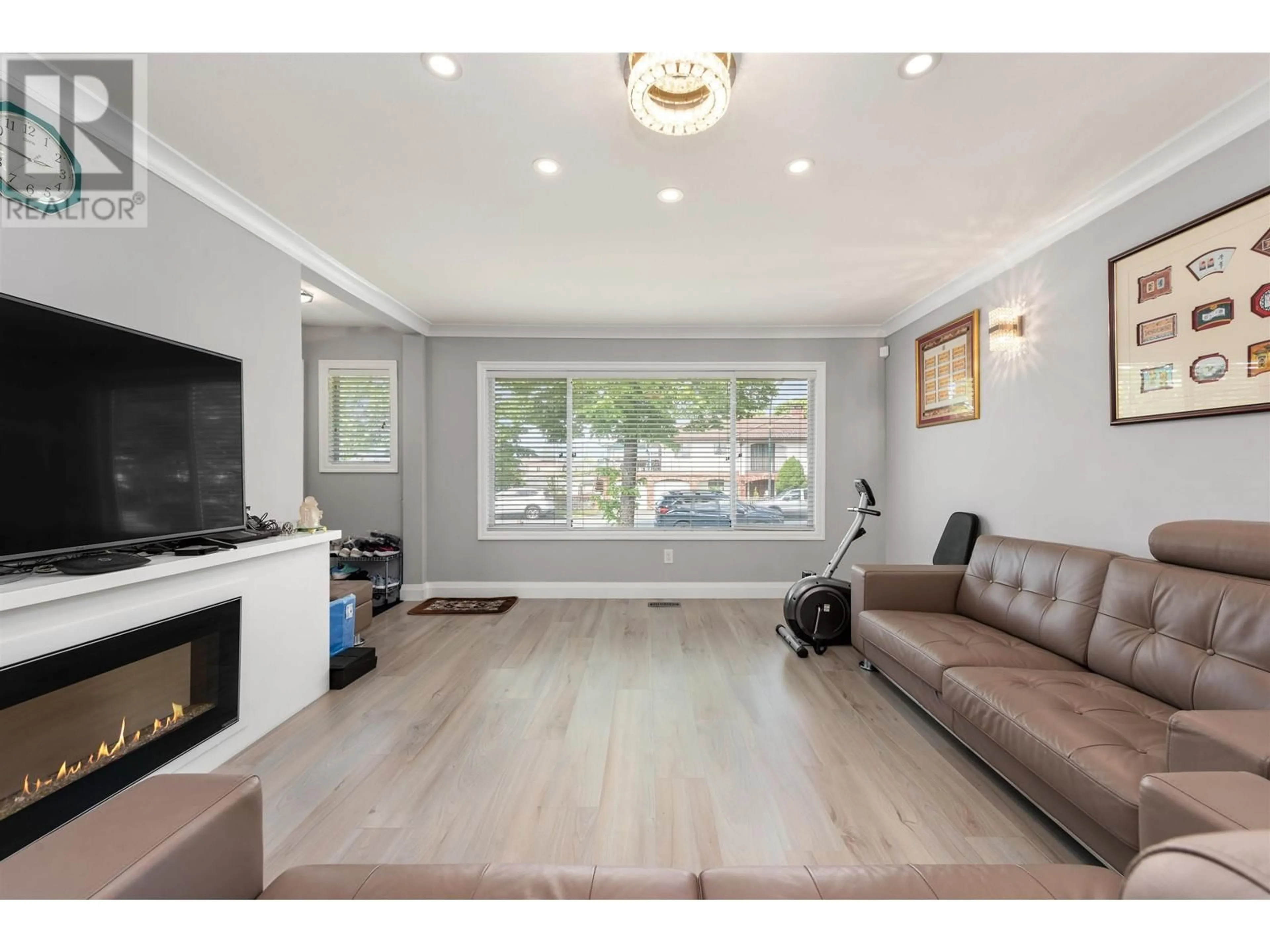 Living room with furniture, wood/laminate floor for 2436 45TH AVENUE, Vancouver British Columbia V5R3B5