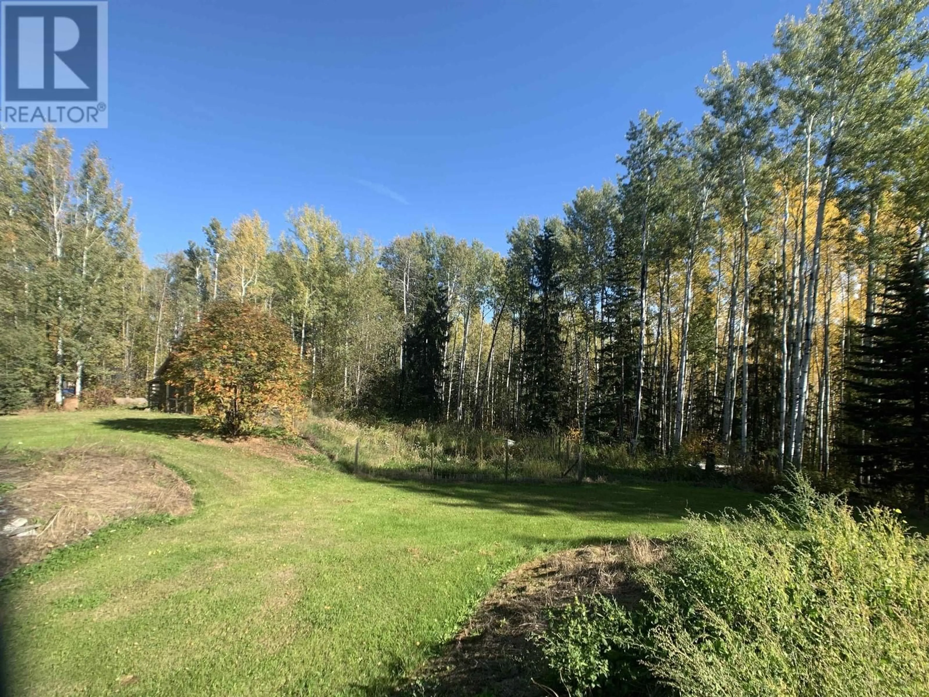 A pic from outside/outdoor area/front of a property/back of a property/a pic from drone, forest/trees view for 19 RAVEN CRESCENT, Fort Nelson British Columbia V0C1R0