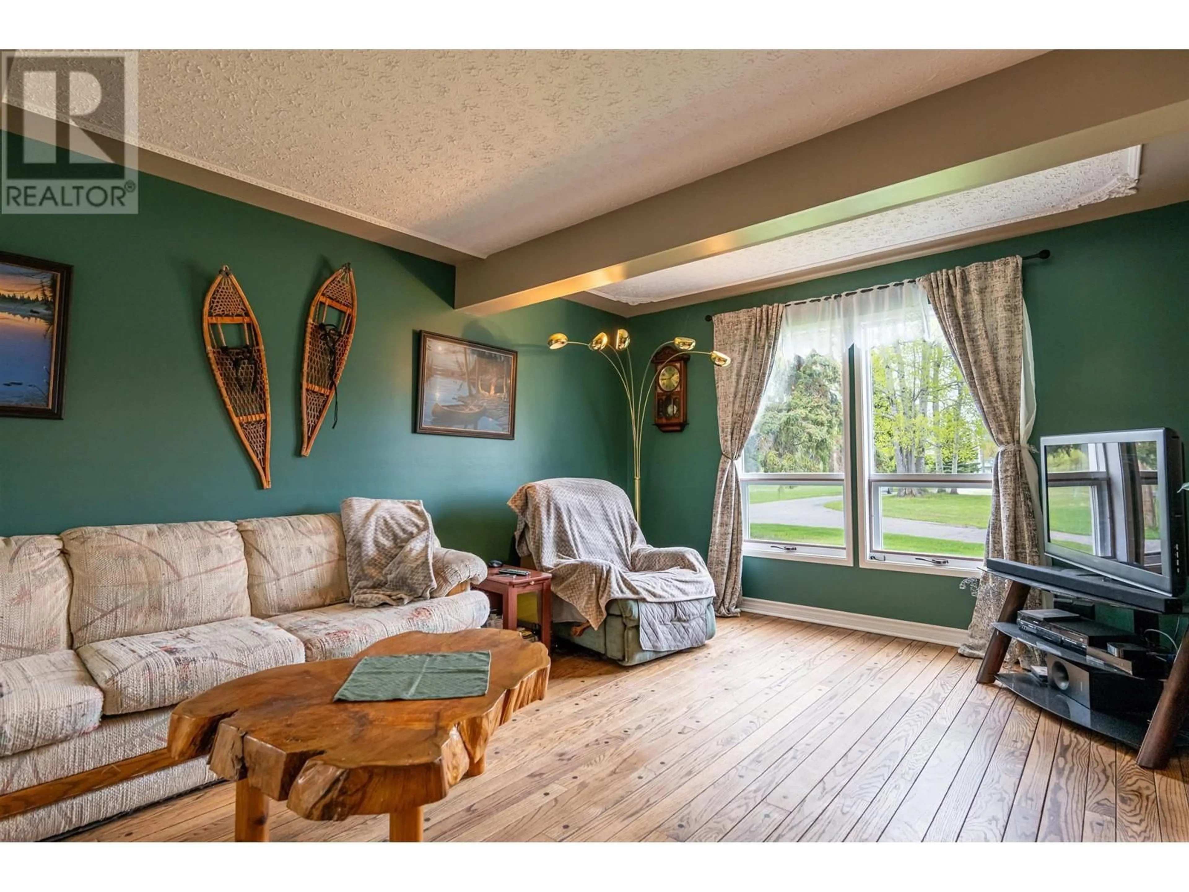 Living room with furniture, wood/laminate floor for 14295 CHIEF LAKE ROAD, Prince George British Columbia V2K5K1