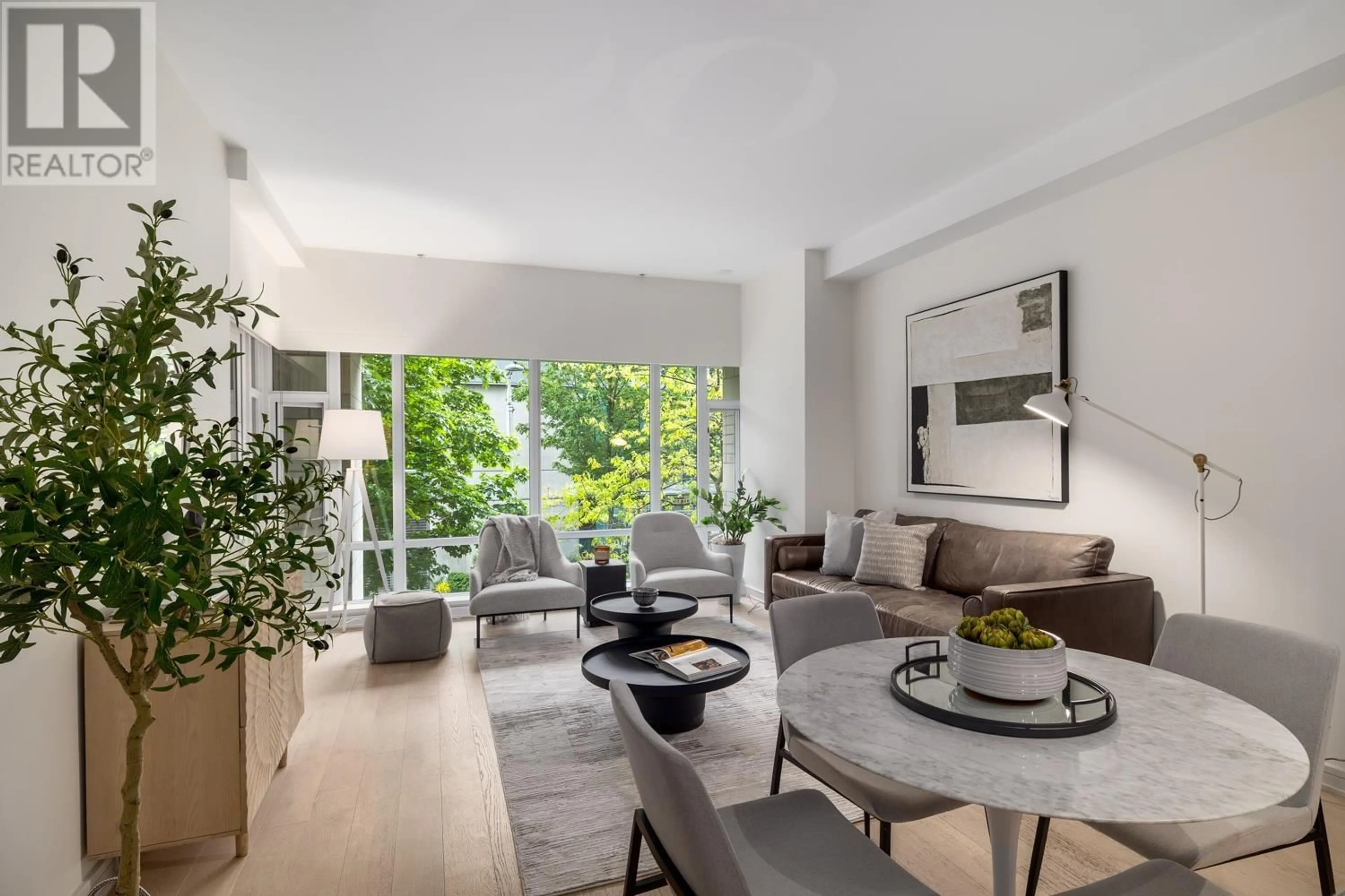 Living room with furniture, unknown for 206 - 12 ATHLETES WAY, Vancouver British Columbia V5Y0B5
