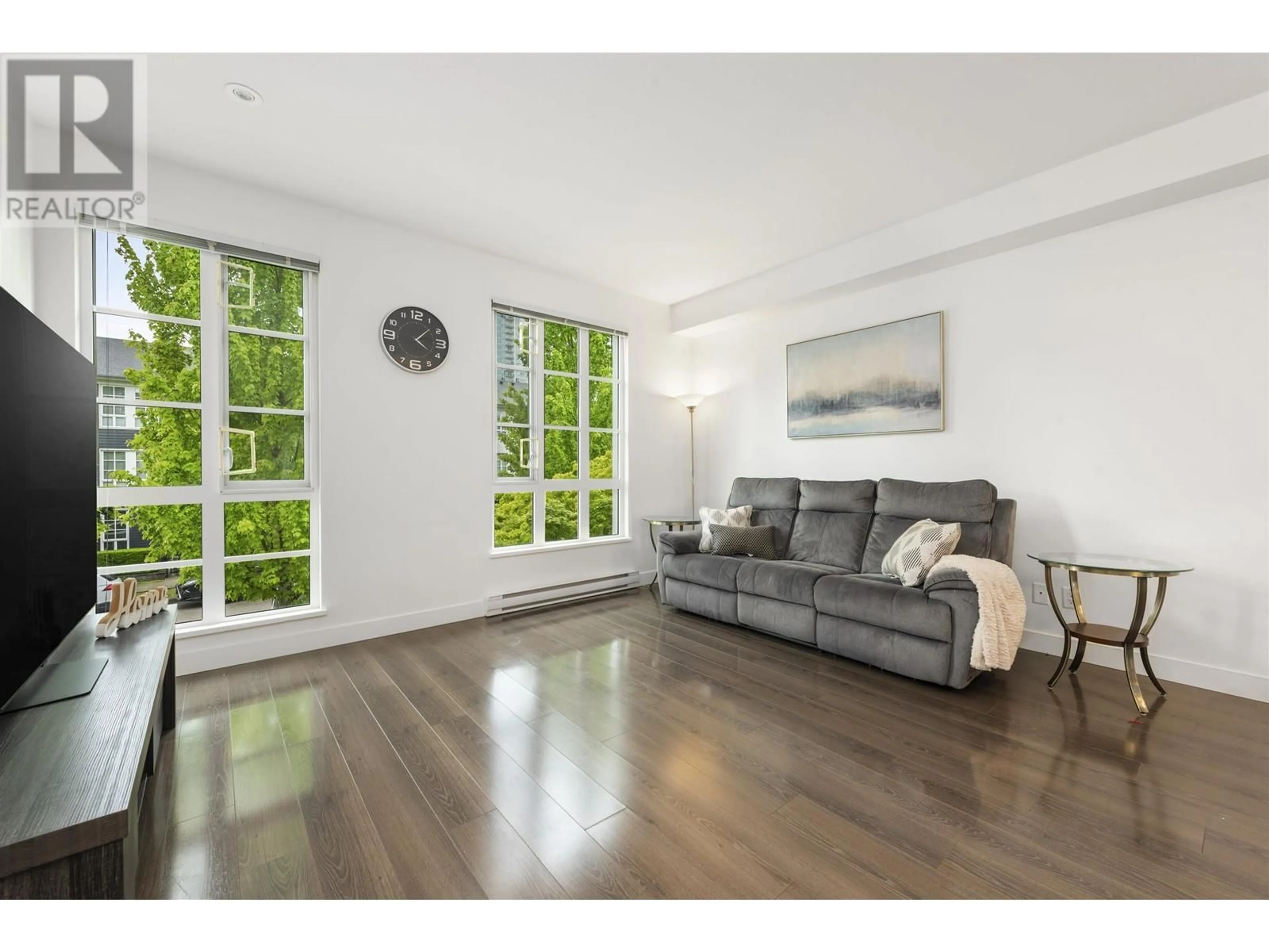 Living room with furniture, wood/laminate floor for 161 - 548 FOSTER AVENUE, Coquitlam British Columbia V3J0E2