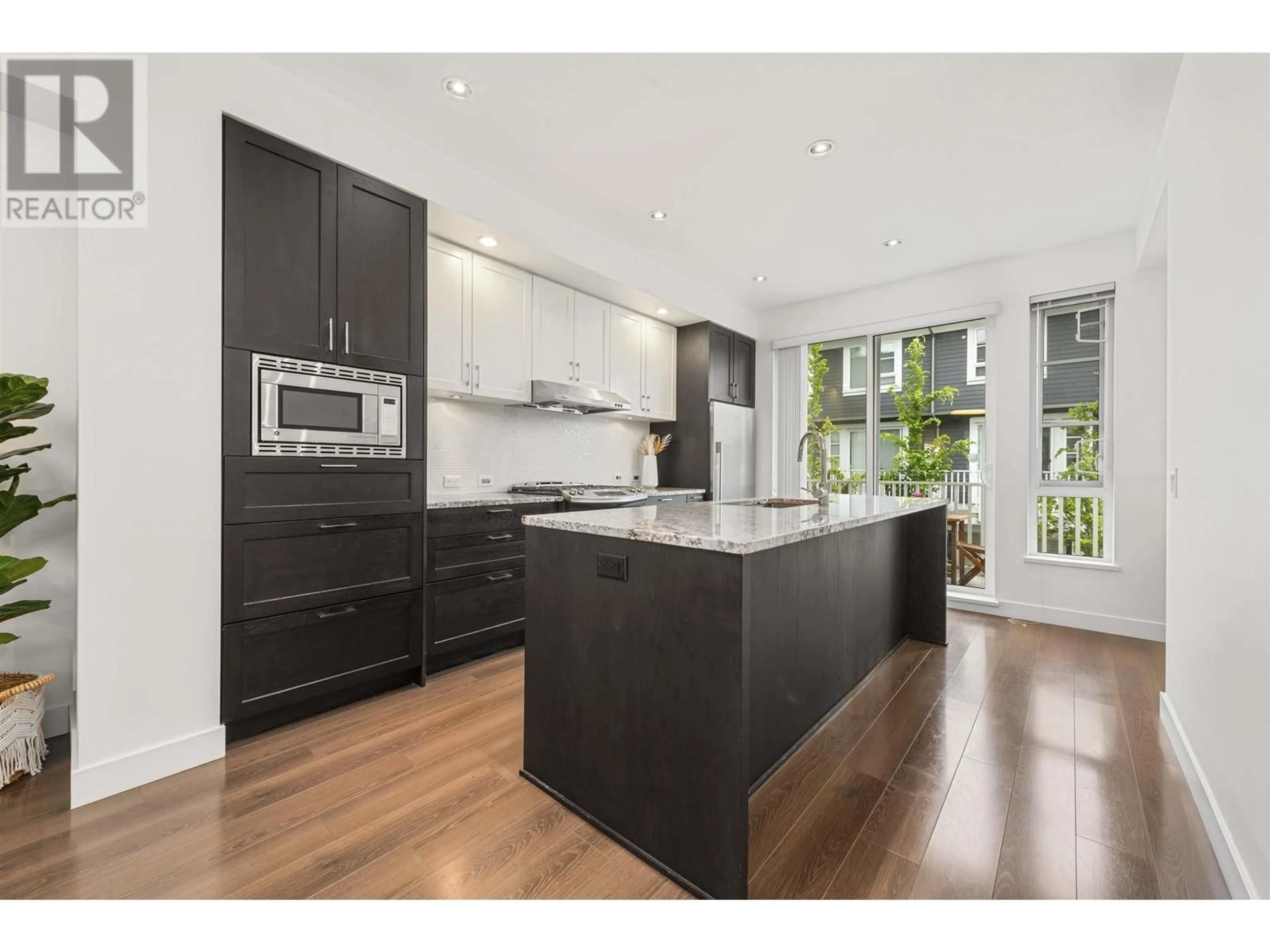 Open concept kitchen, wood/laminate floor for 161 - 548 FOSTER AVENUE, Coquitlam British Columbia V3J0E2