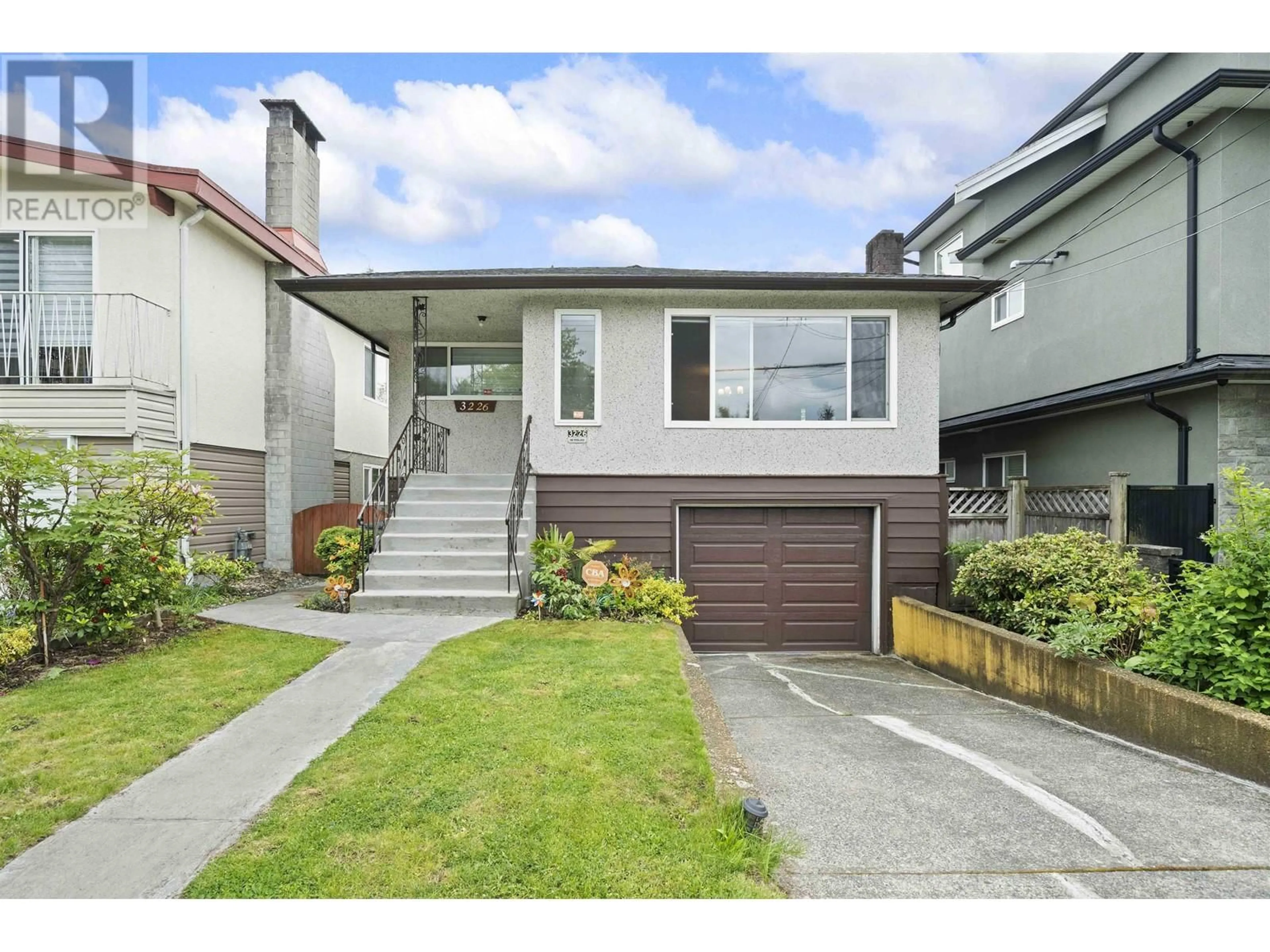 Home with vinyl exterior material, street for 3226 47 AVENUE, Vancouver British Columbia V5S1C6