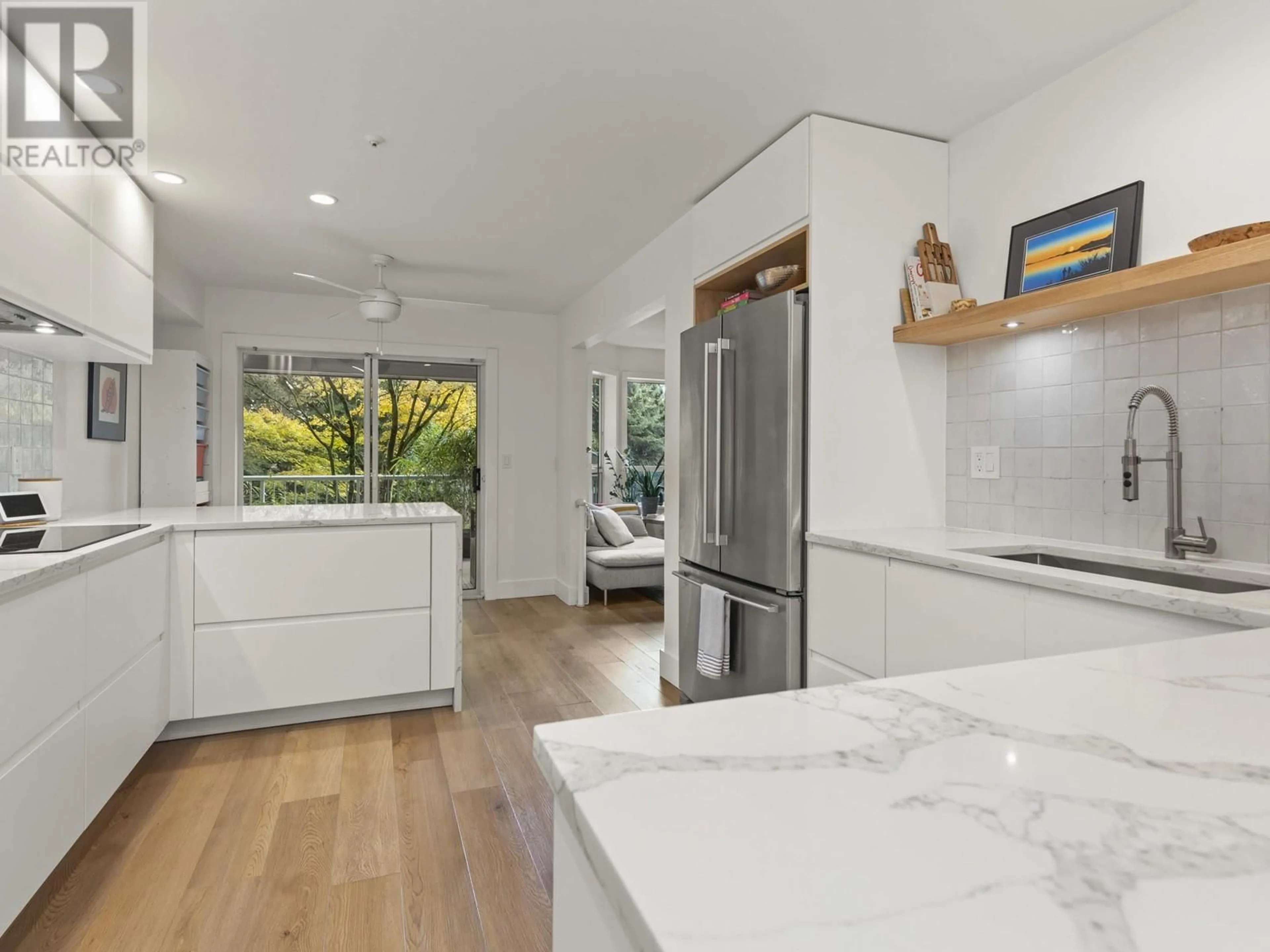 Open concept kitchen, ceramic/tile floor for 105 - 1150 LYNN VALLEY ROAD, North Vancouver British Columbia V7J1Z9
