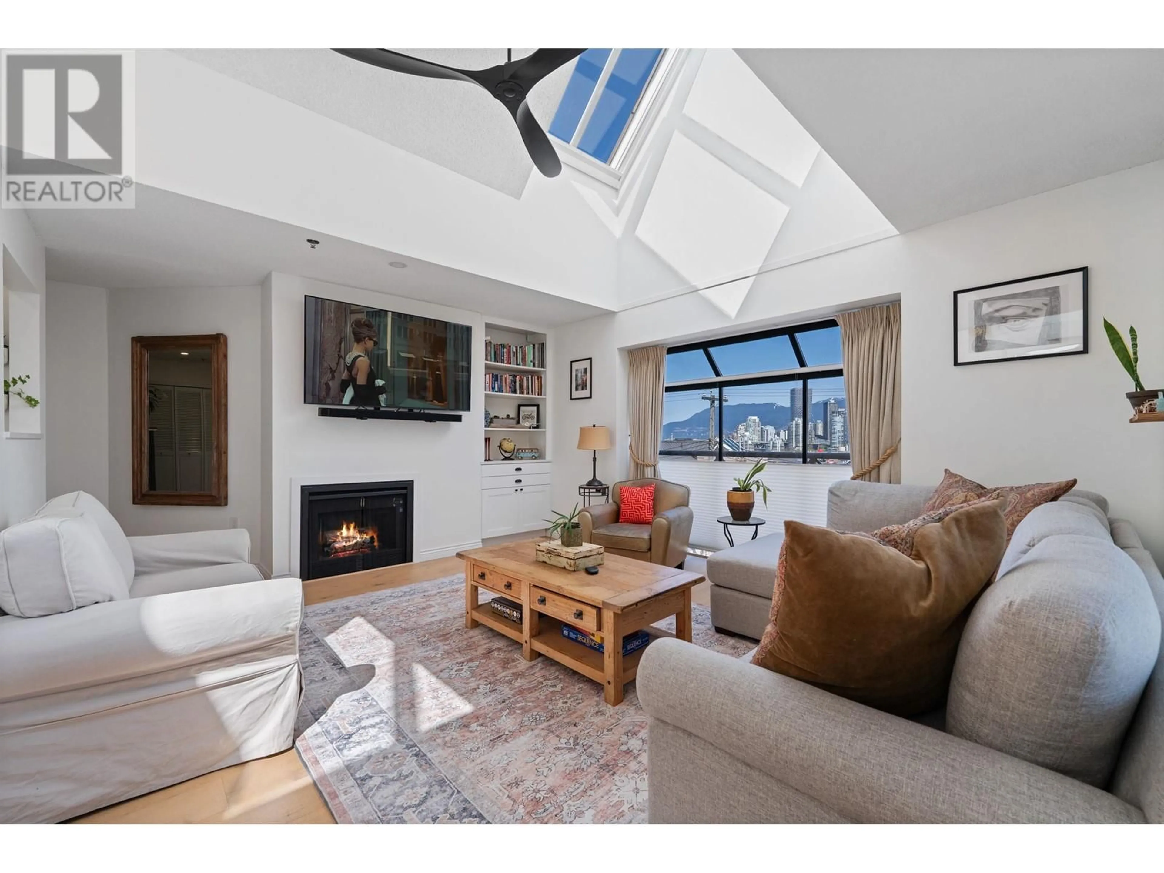 Living room with furniture, unknown for 301 - 910 8TH AVENUE, Vancouver British Columbia V5Z1E5