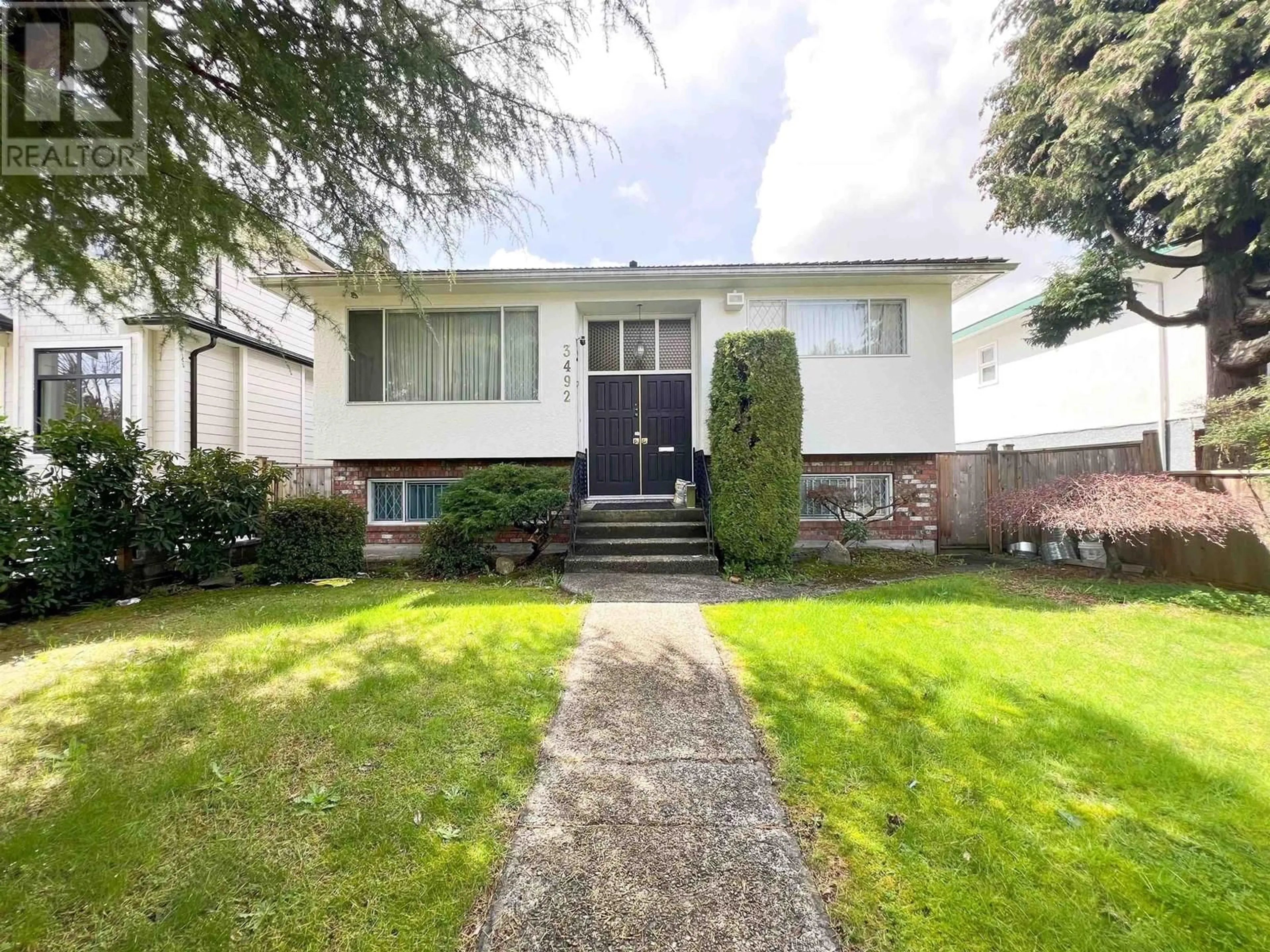 Home with vinyl exterior material, street for 3492 49TH AVENUE, Vancouver British Columbia V5S1M2