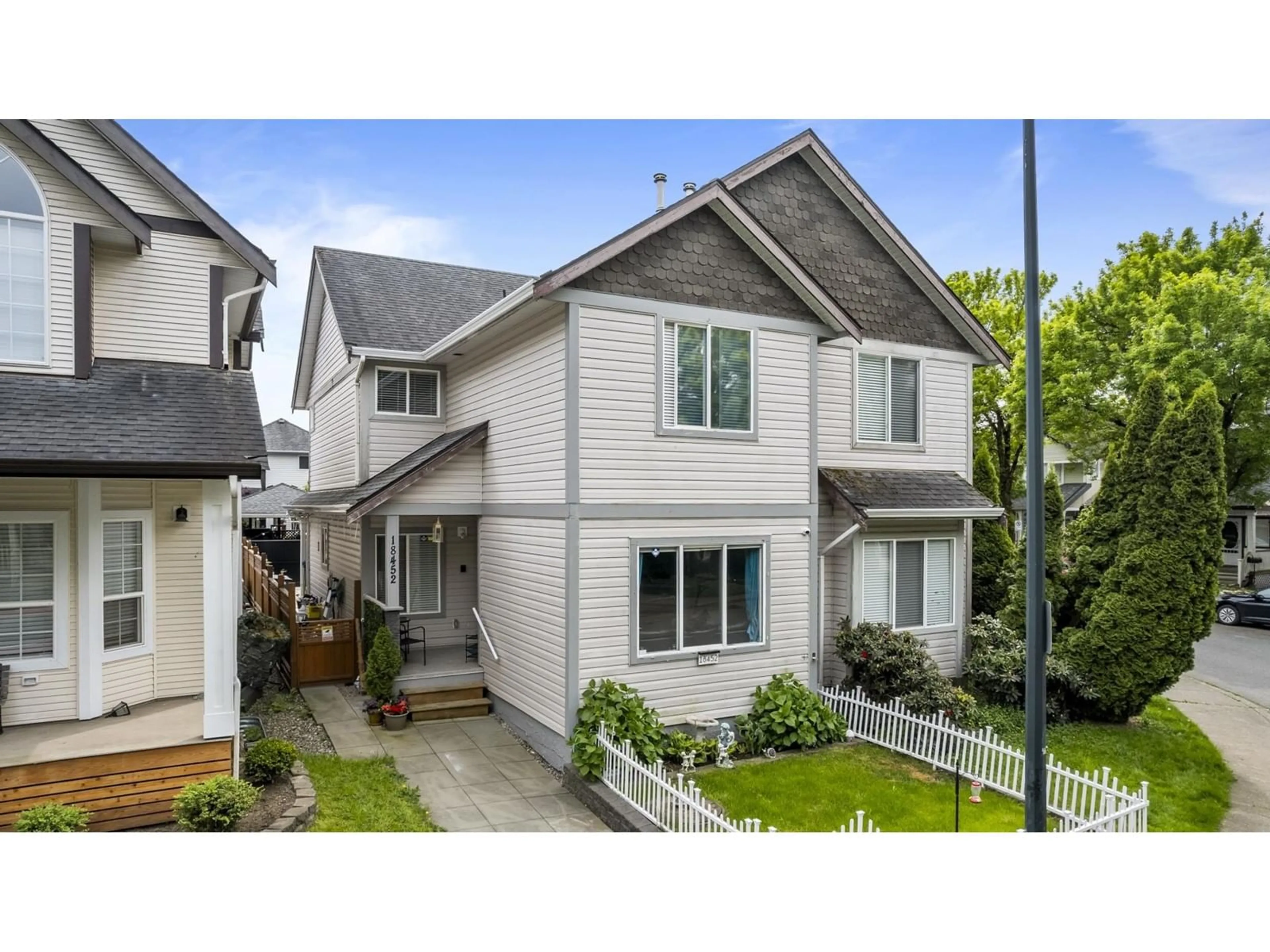 Home with vinyl exterior material, street for 18452 66, Surrey British Columbia V3S8V6