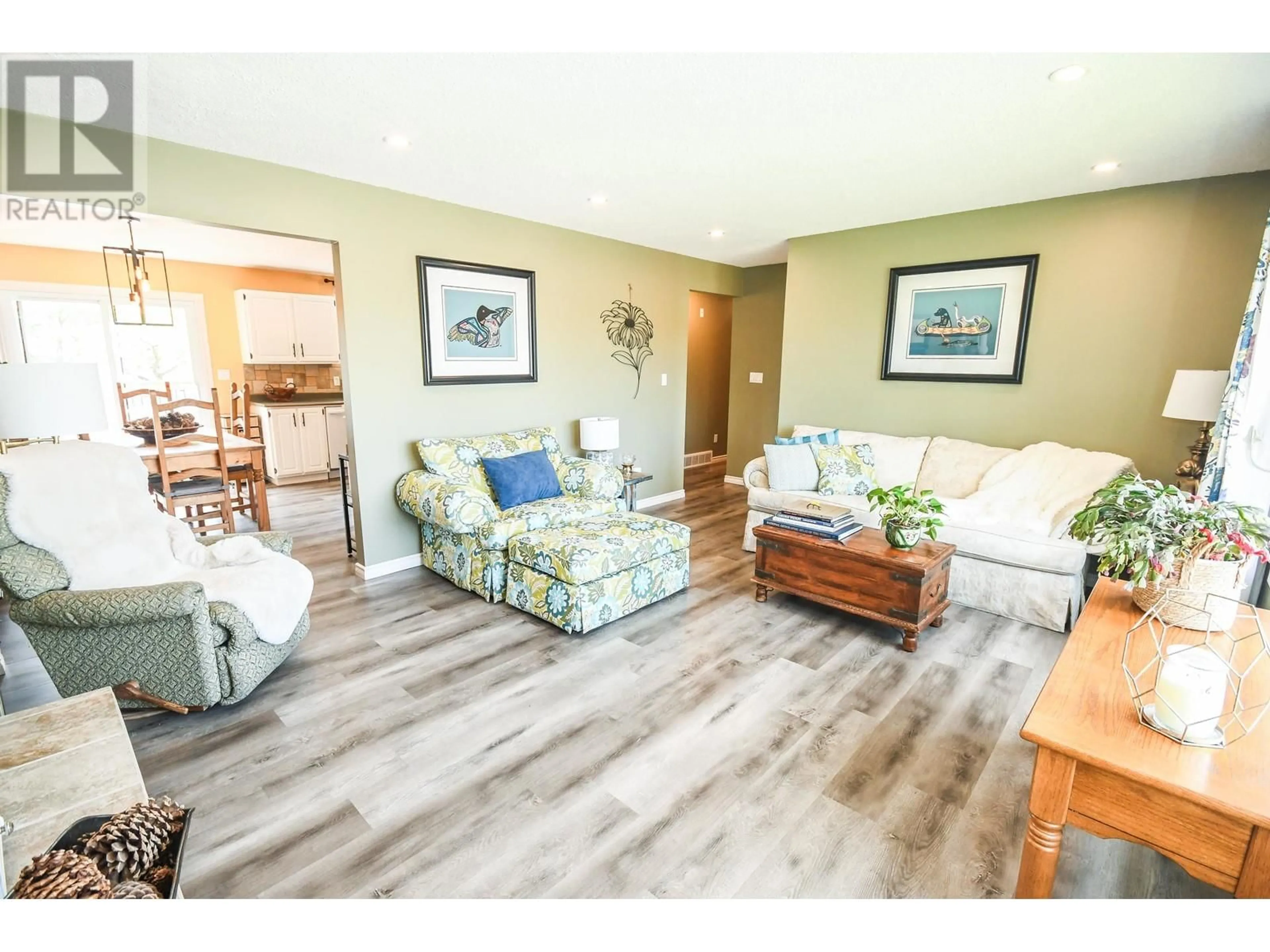 Living room with furniture, wood/laminate floor for 4257 DAVIE AVENUE, Prince George British Columbia V2M4G9