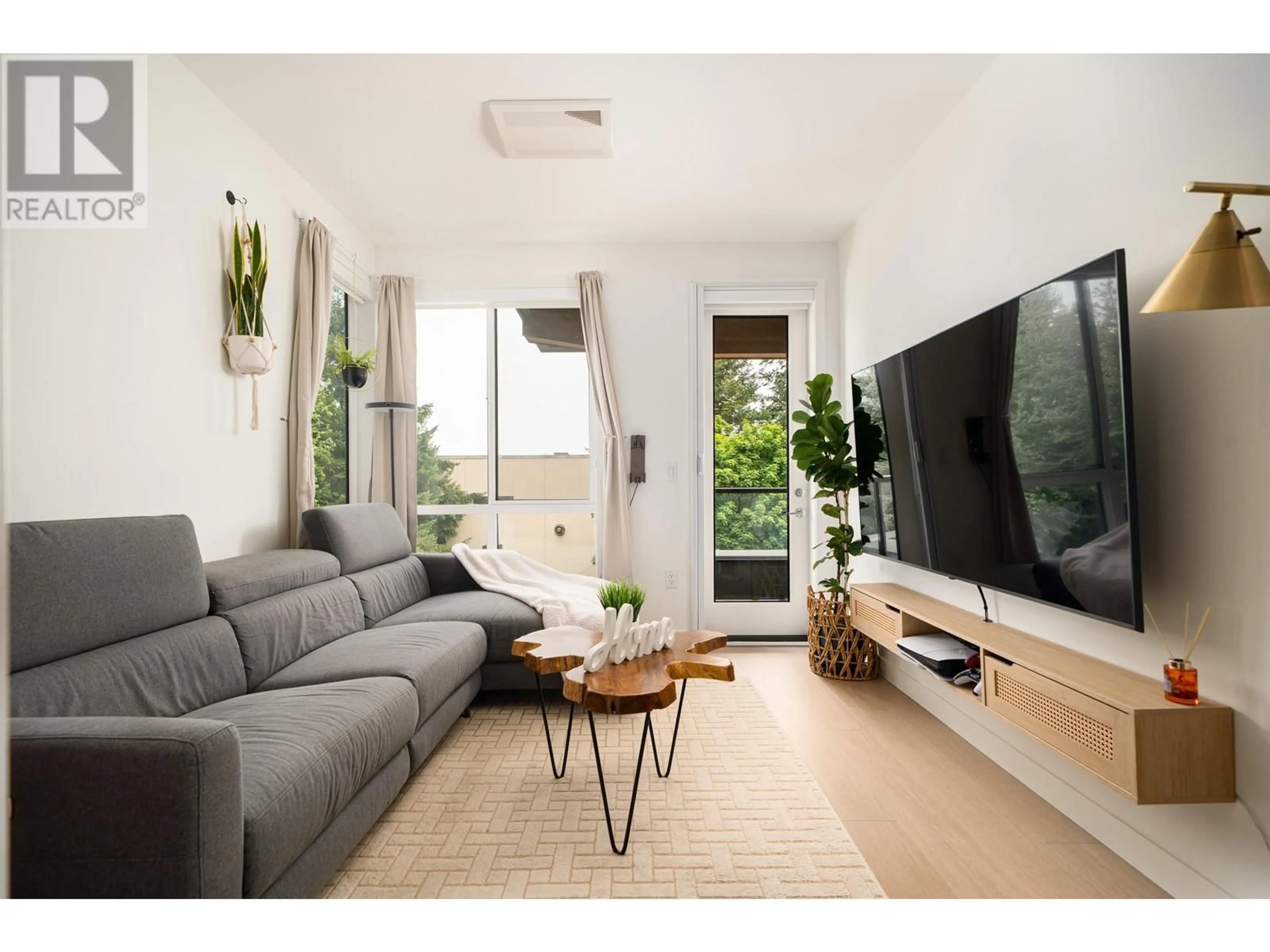 Living room with furniture, unknown for 409 - 7588 16TH STREET, Burnaby British Columbia V3N0H8