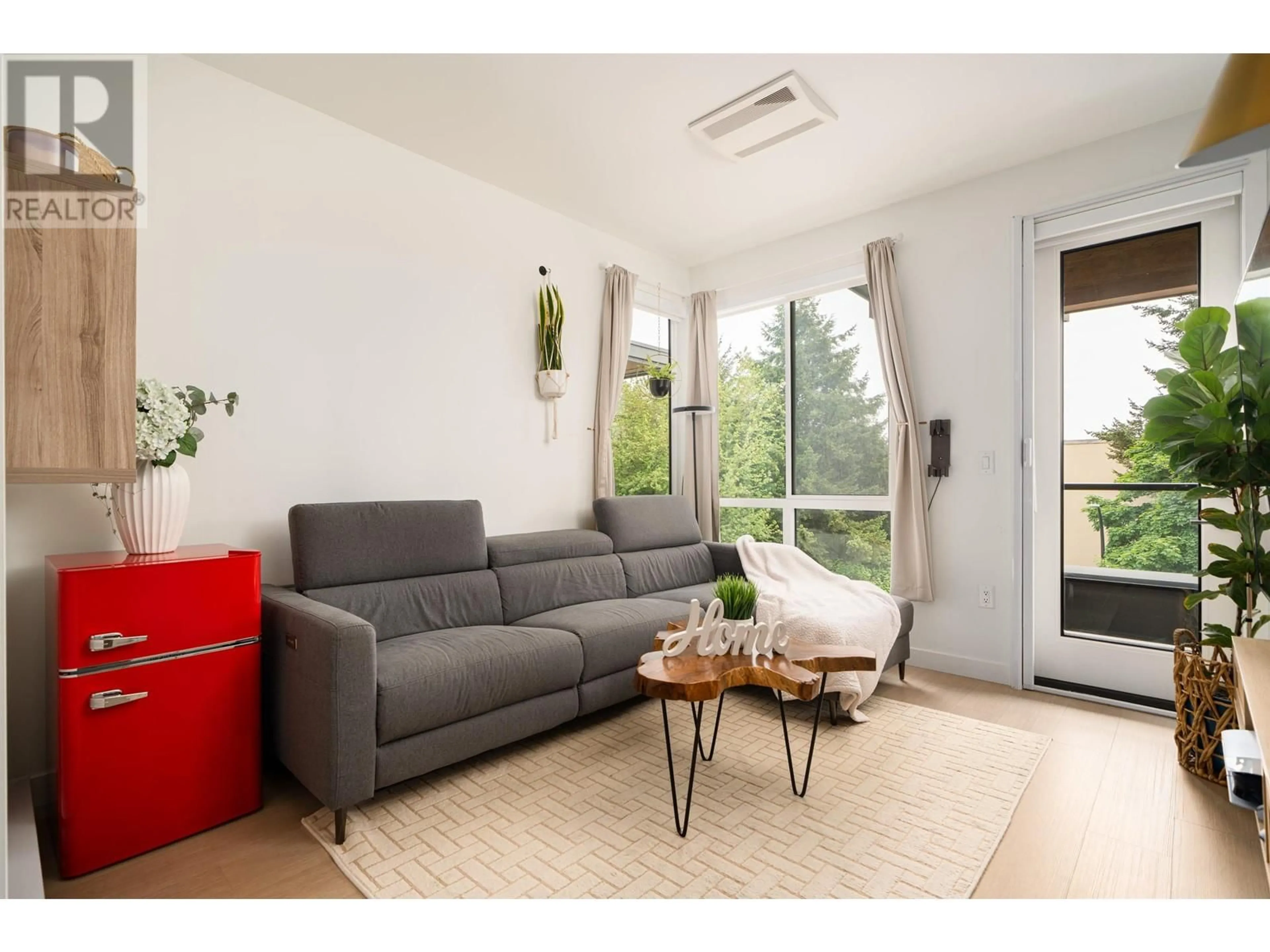 Living room with furniture, unknown for 409 - 7588 16TH STREET, Burnaby British Columbia V3N0H8