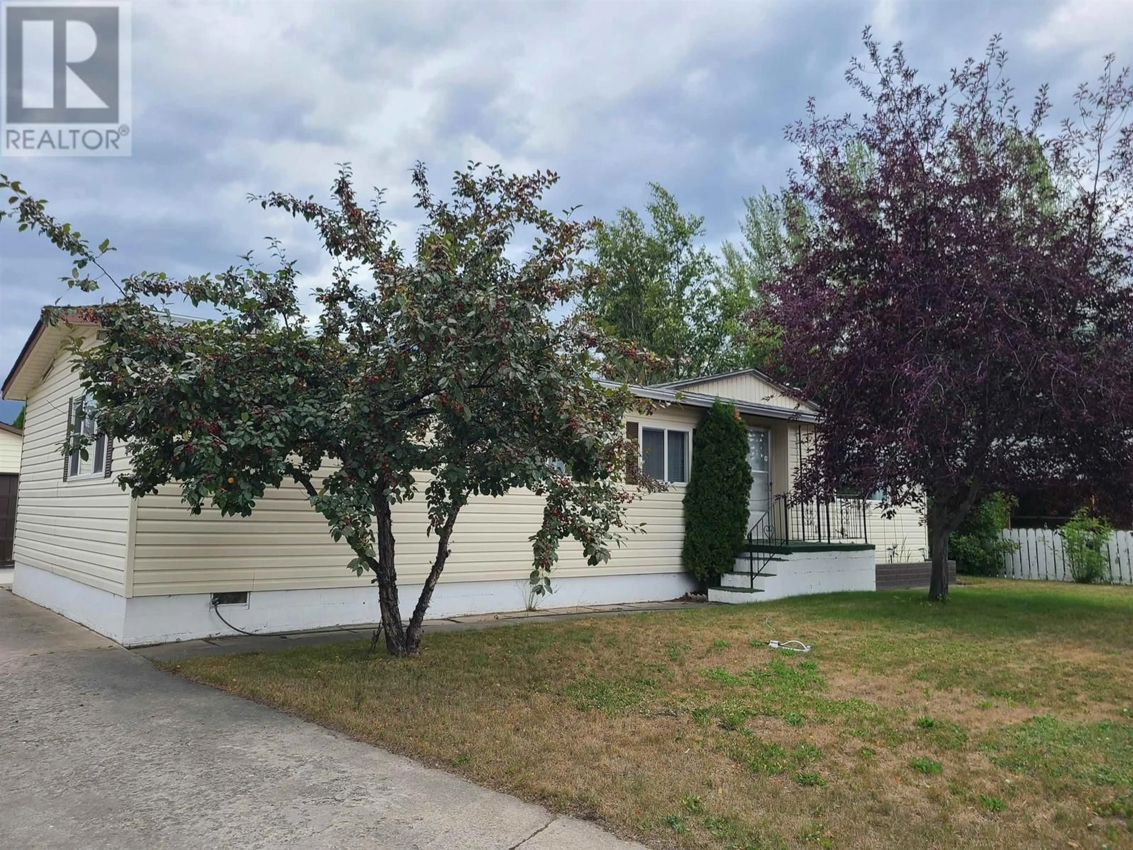 Home with vinyl exterior material, street for 1480 7TH AVENUE, Valemount British Columbia V0E2Z0