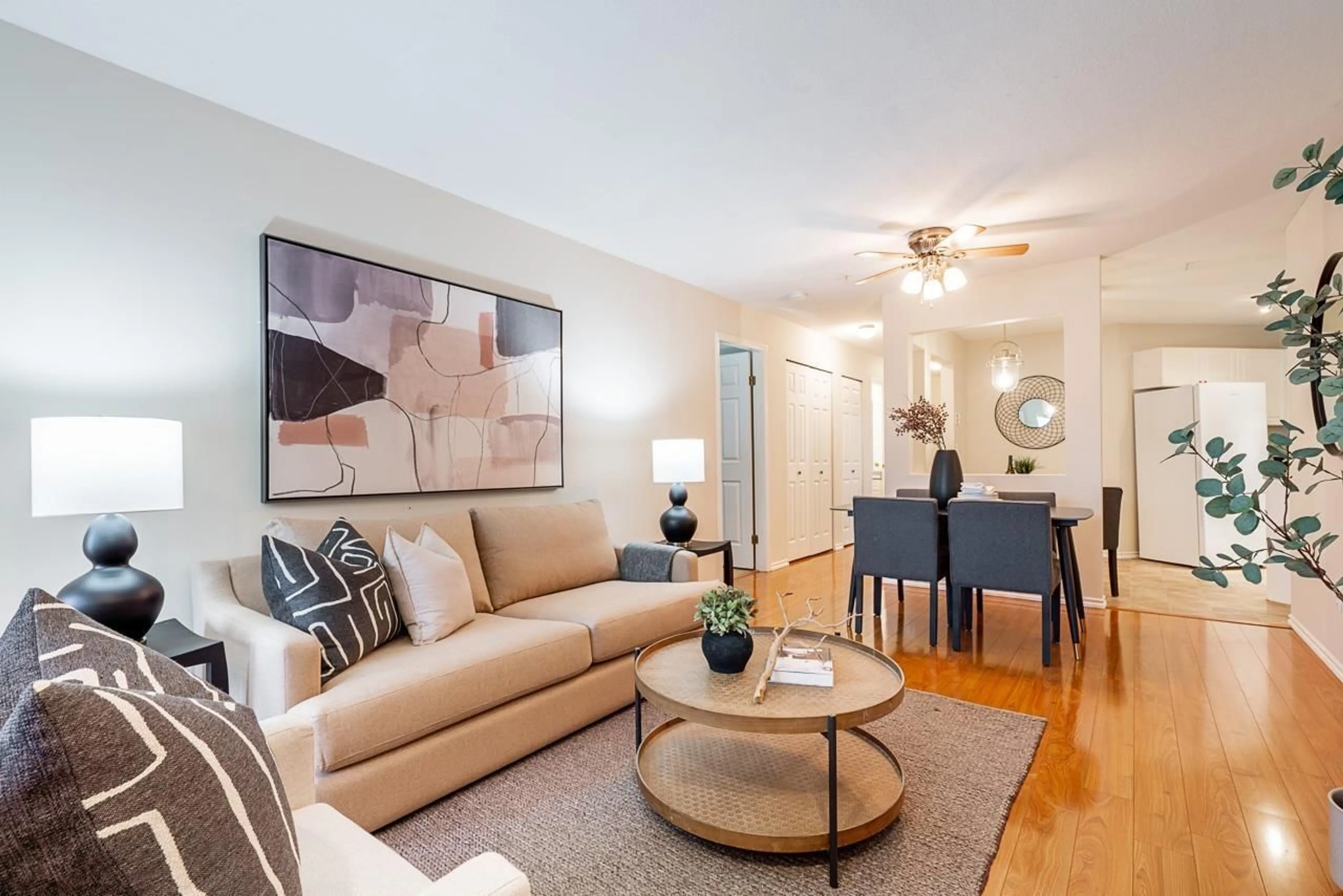 Living room with furniture, wood/laminate floor for 421 - 8068 120A, Surrey British Columbia V3W3P3
