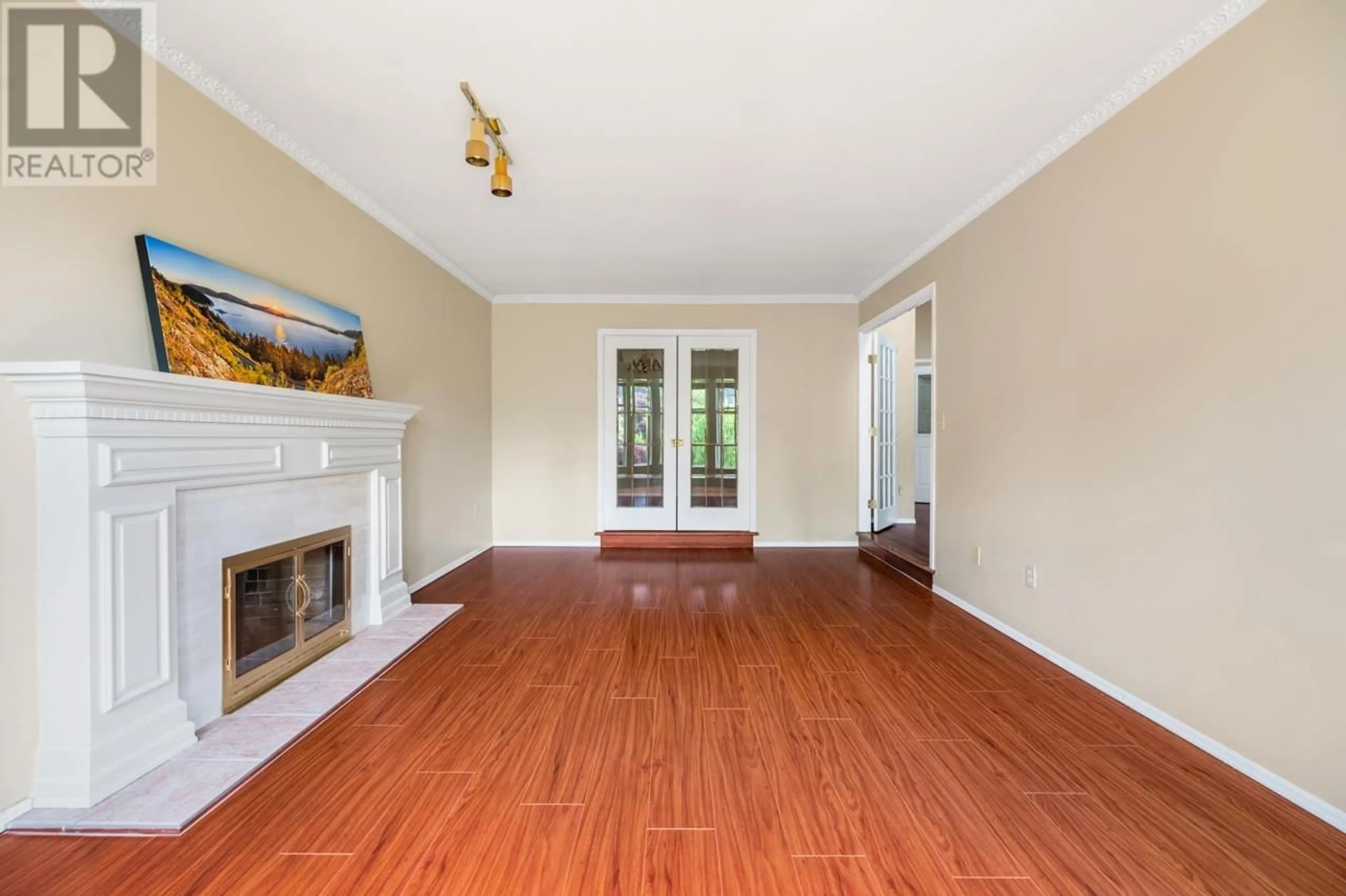Living room with furniture, wood/laminate floor for 394 HICKEY DRIVE, Coquitlam British Columbia V3K6C6