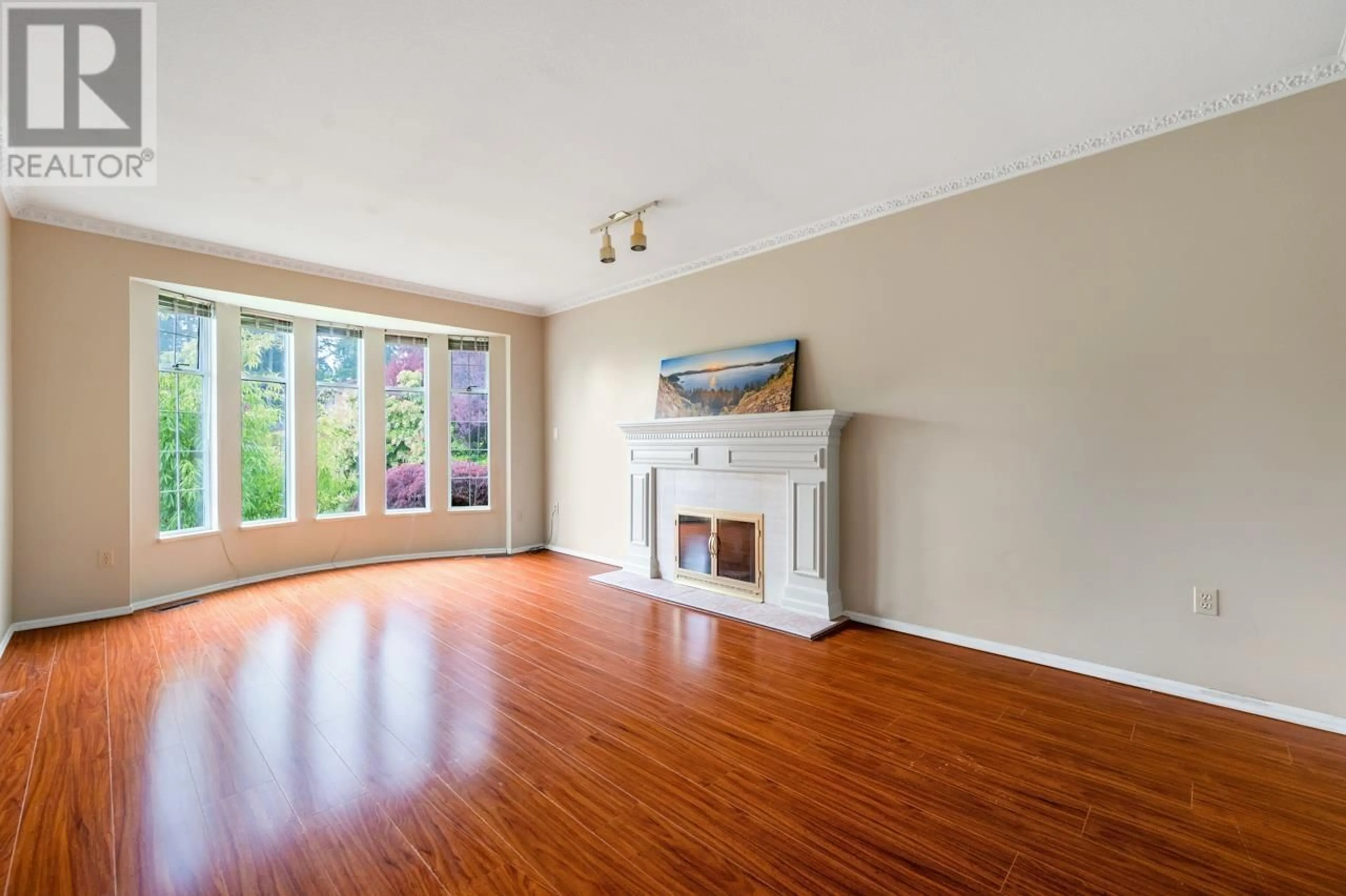 Living room with furniture, wood/laminate floor for 394 HICKEY DRIVE, Coquitlam British Columbia V3K6C6