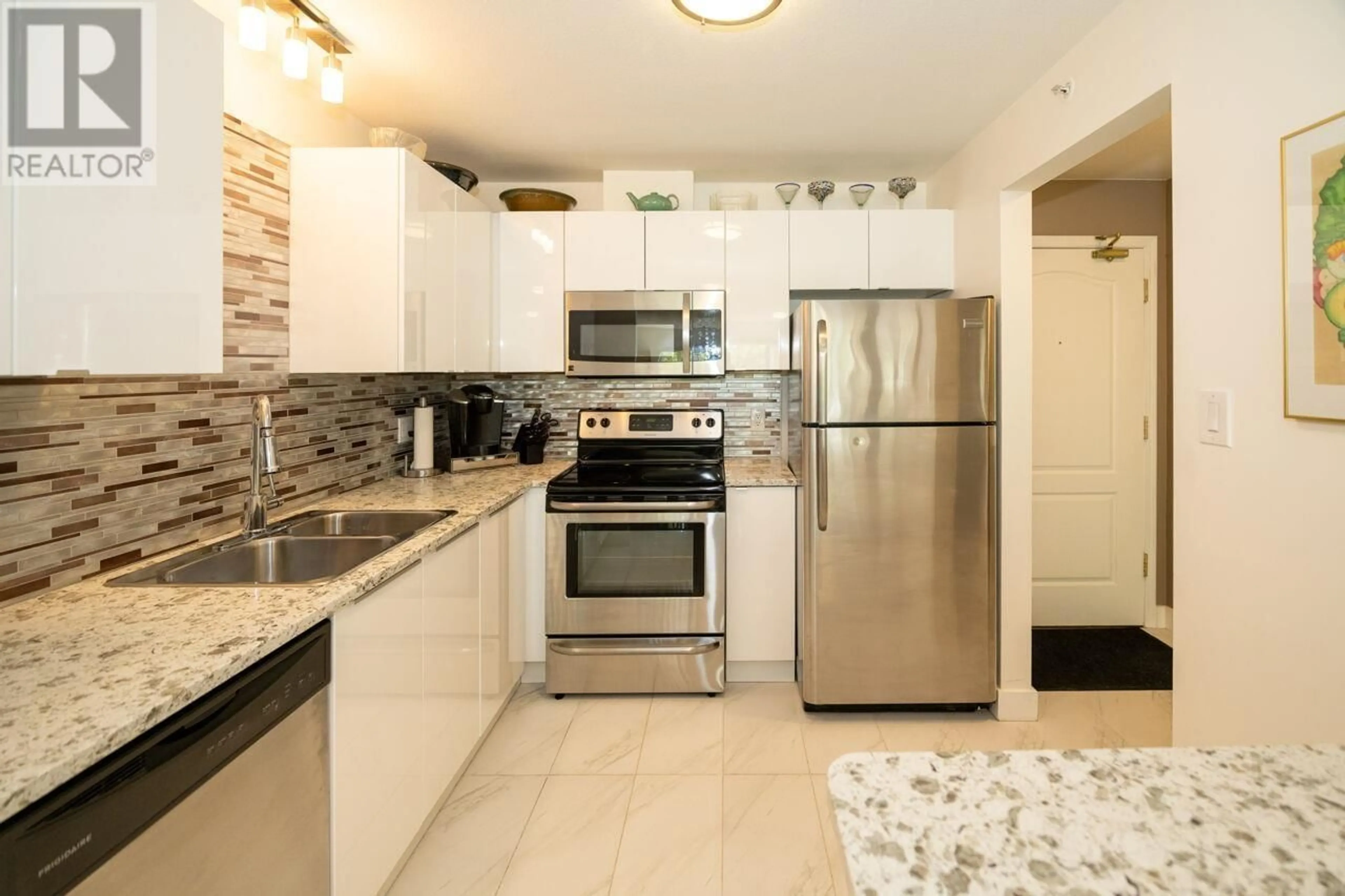 Standard kitchen, ceramic/tile floor for 202 - 2551 PARKVIEW LANE, Port Coquitlam British Columbia V3C6J8
