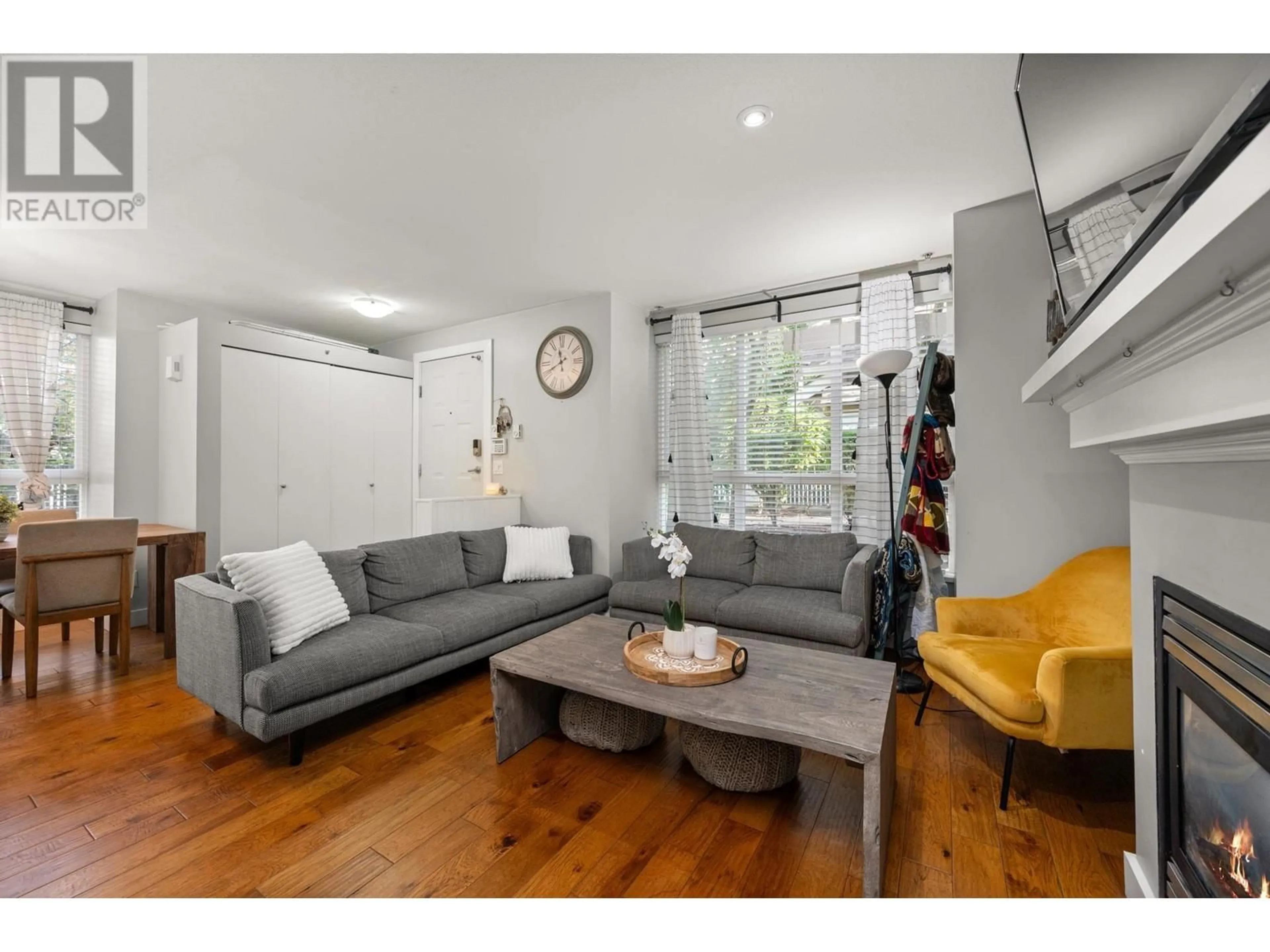 Living room with furniture, unknown for 1 - 1075 LYNN VALLEY ROAD, North Vancouver British Columbia V7J1Z6