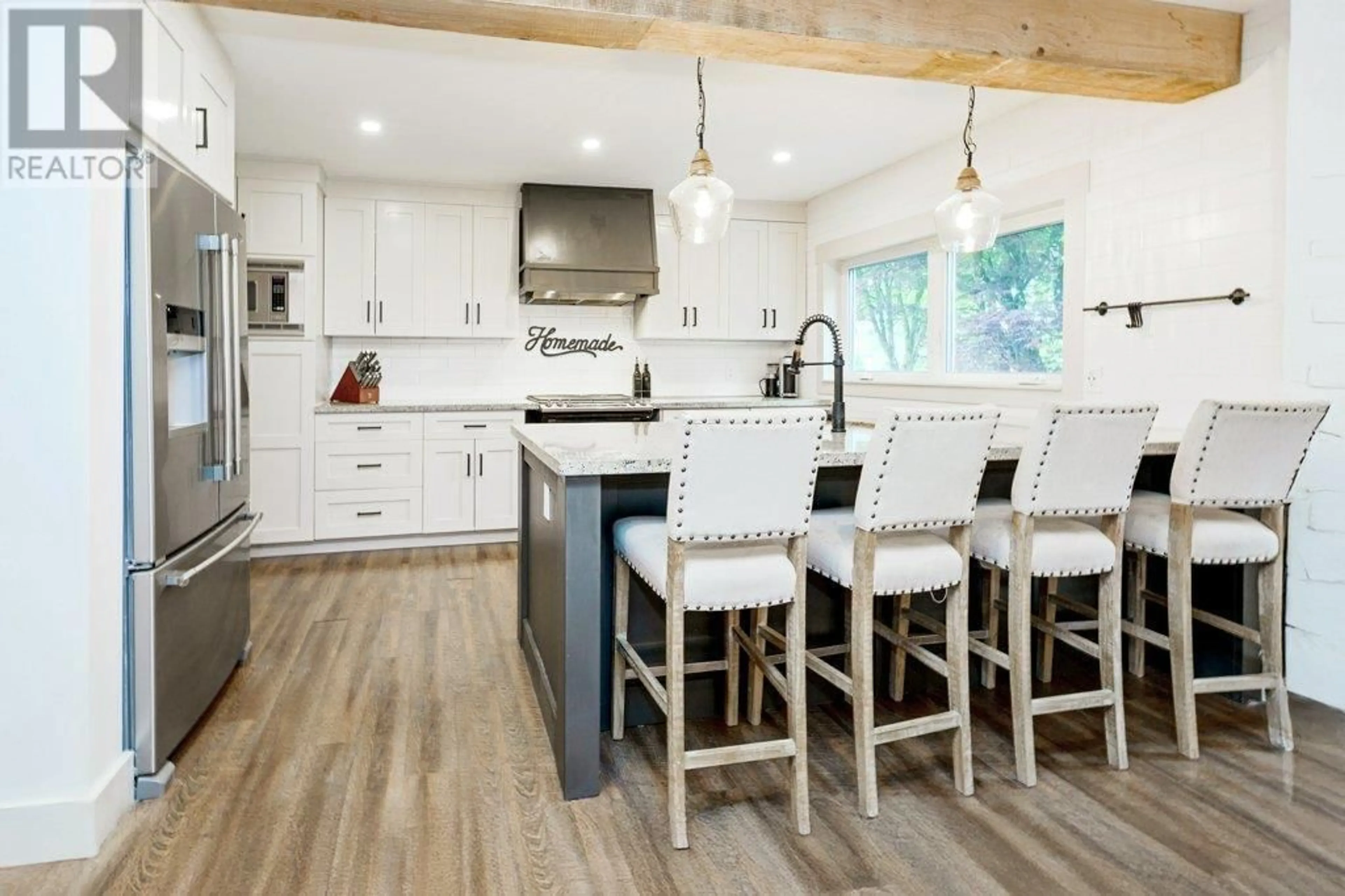 Open concept kitchen, wood/laminate floor for 20831 RIVER ROAD, Maple Ridge British Columbia V2X1Z8