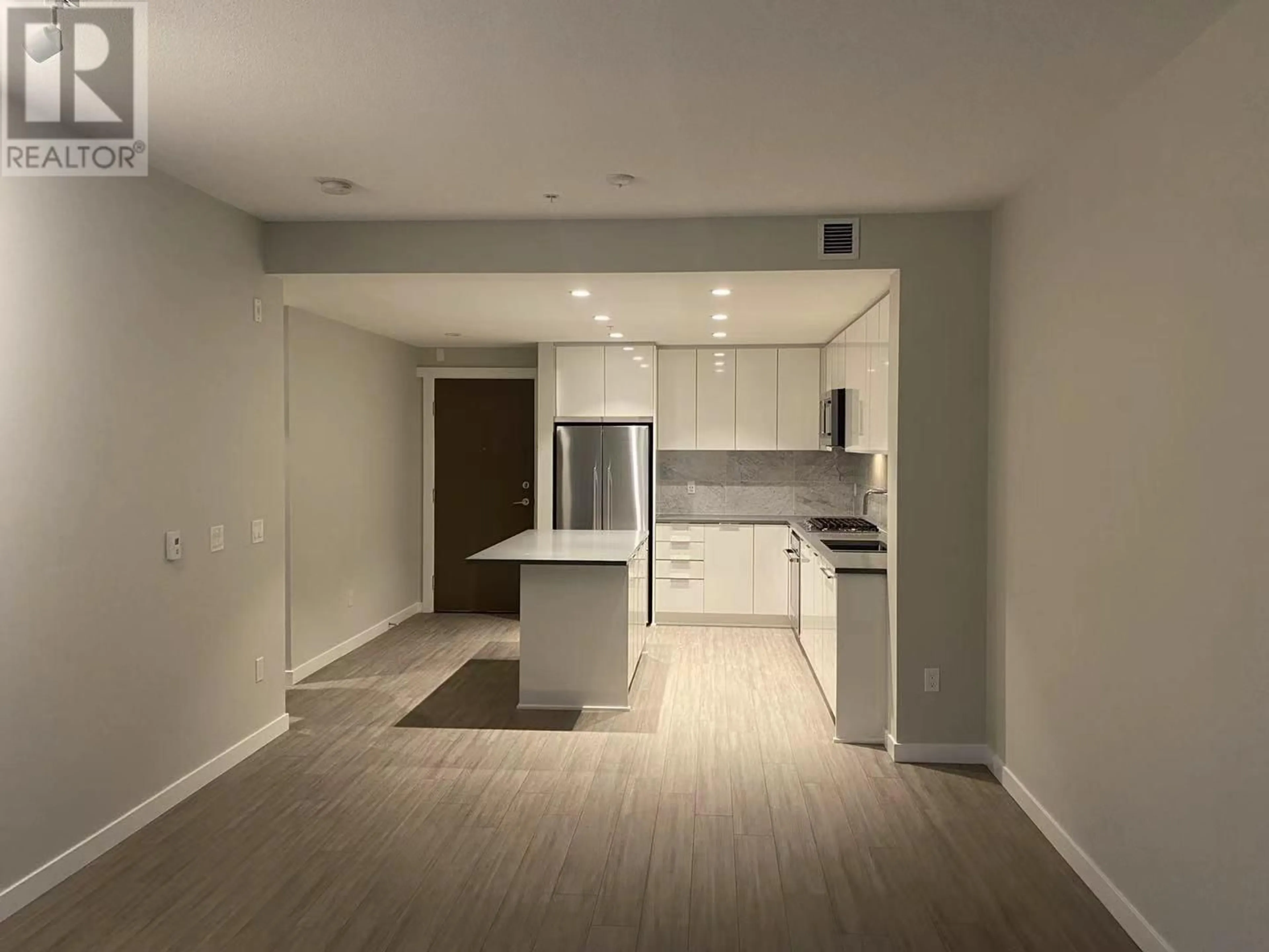 Open concept kitchen, unknown for 202 - 2651 LIBRARY LANE, North Vancouver British Columbia V7J0C1