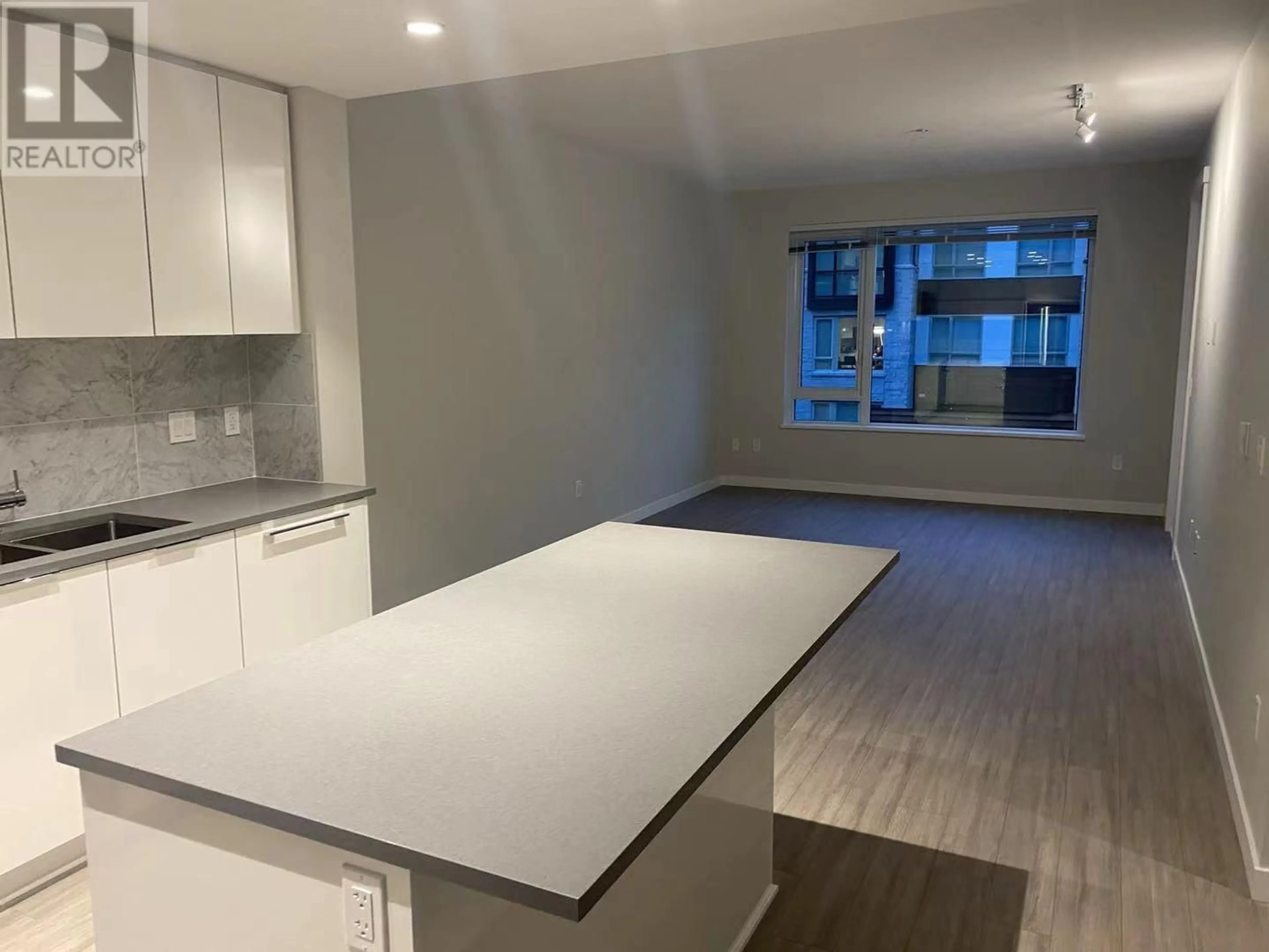 Open concept kitchen, unknown for 202 - 2651 LIBRARY LANE, North Vancouver British Columbia V7J0C1