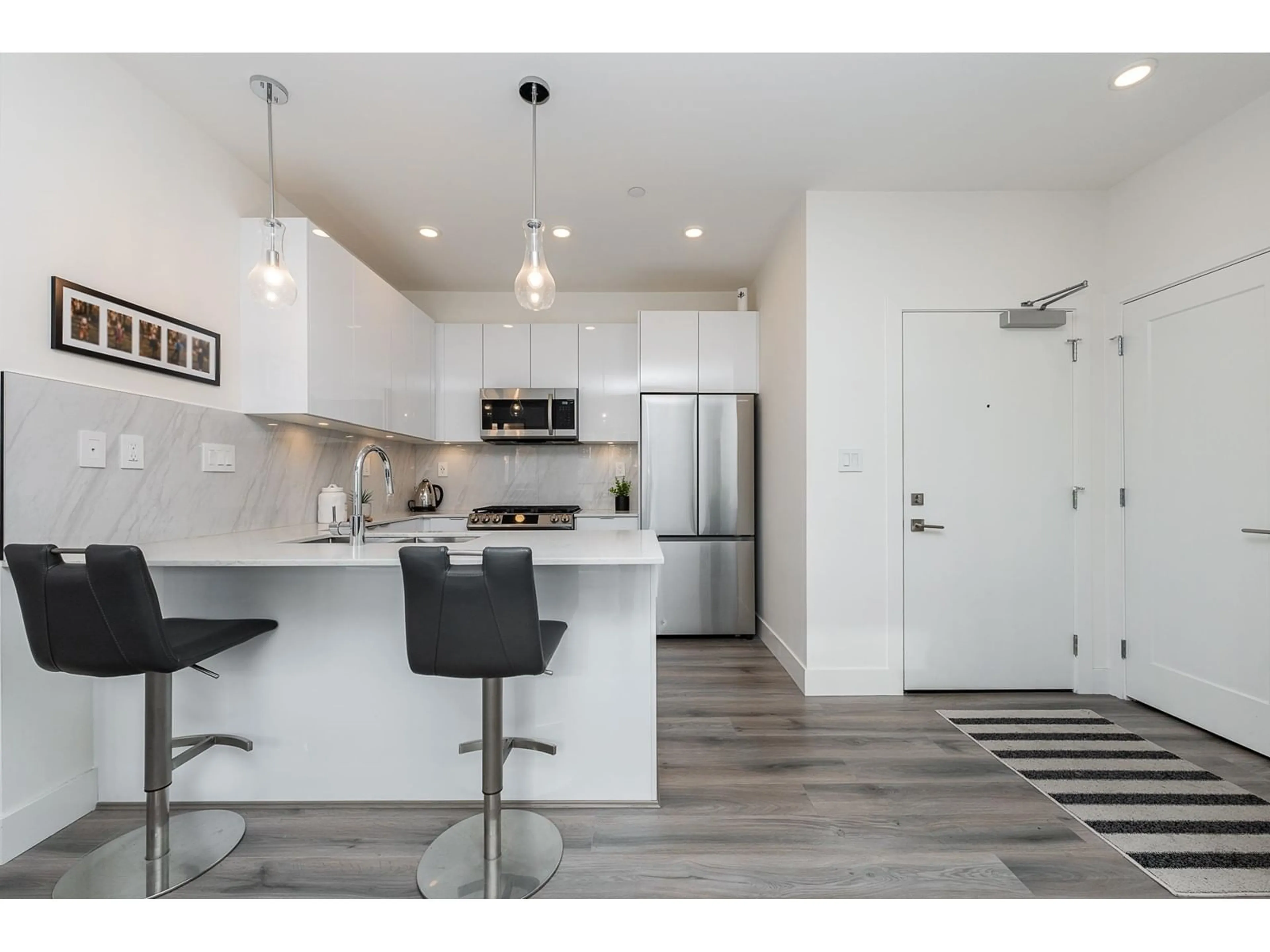Open concept kitchen, unknown for A303 - 8447 202, Langley British Columbia V2Y4K1