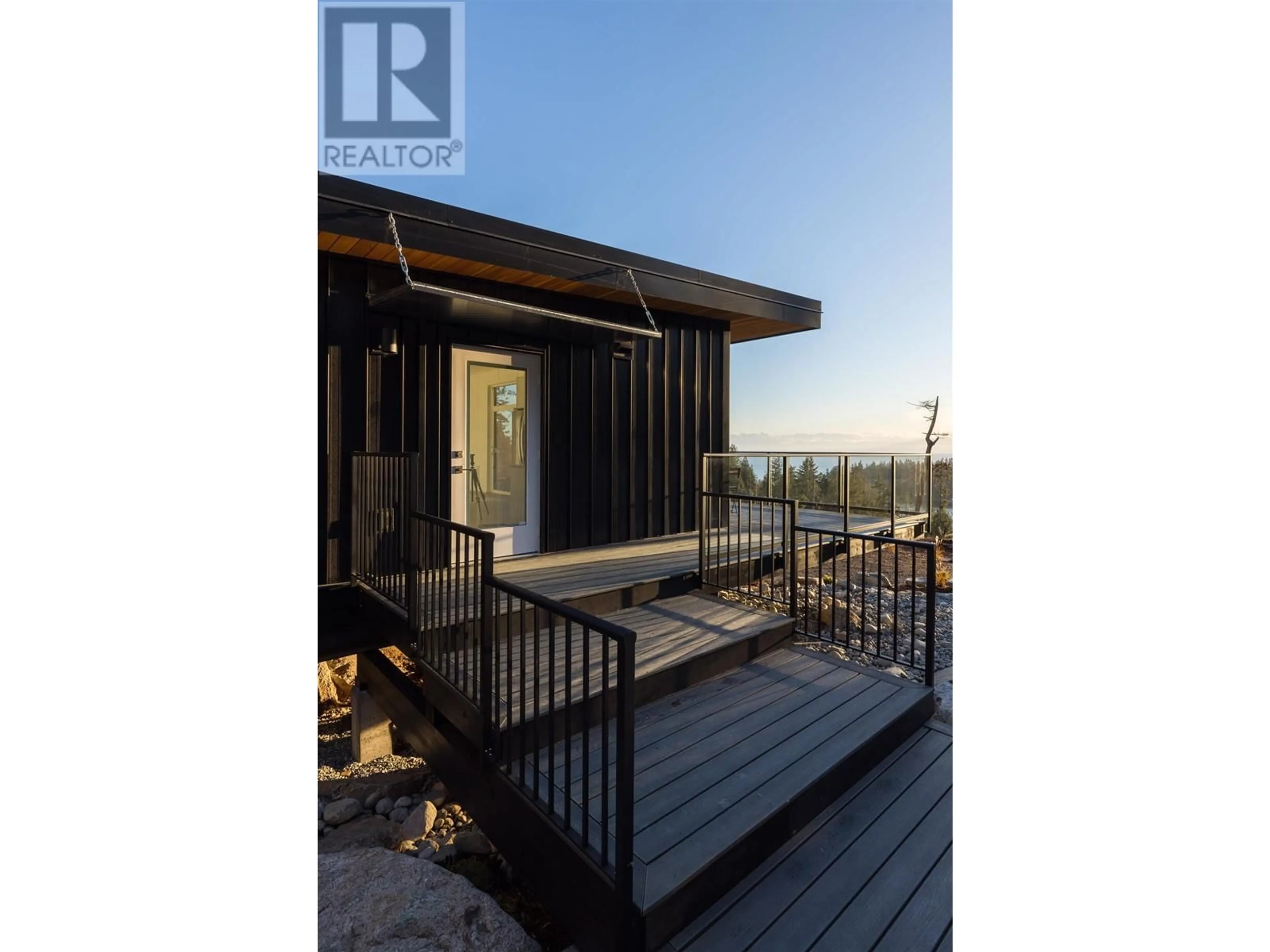 A pic from outside/outdoor area/front of a property/back of a property/a pic from drone, water/lake/river/ocean view for 5782 SARGEANT BAY HEIGHTS ROAD, Halfmoon Bay British Columbia V7Z1C3