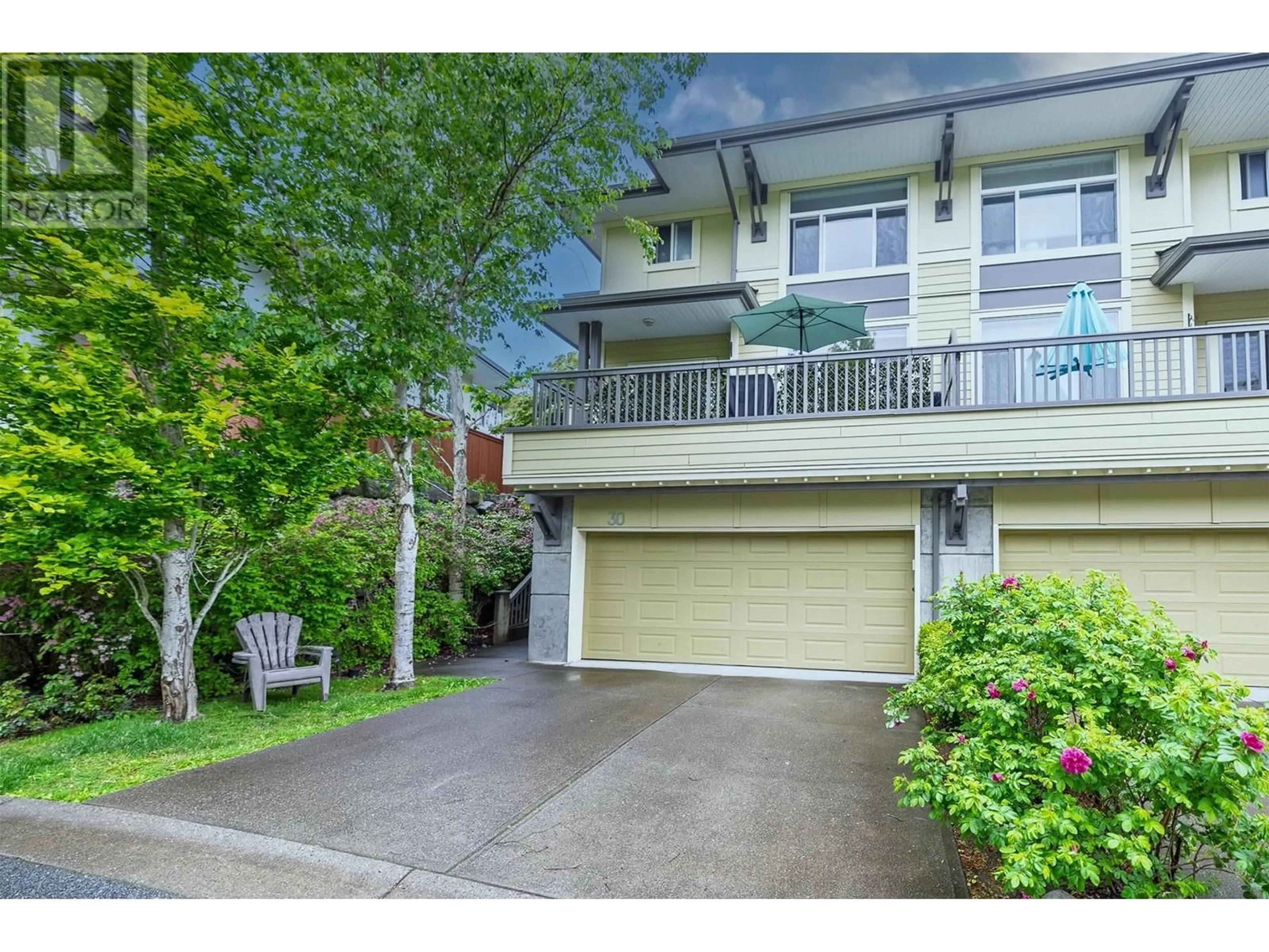 A pic from outside/outdoor area/front of a property/back of a property/a pic from drone, street for 30 - 40632 GOVERNMENT ROAD, Squamish British Columbia V8B0M7