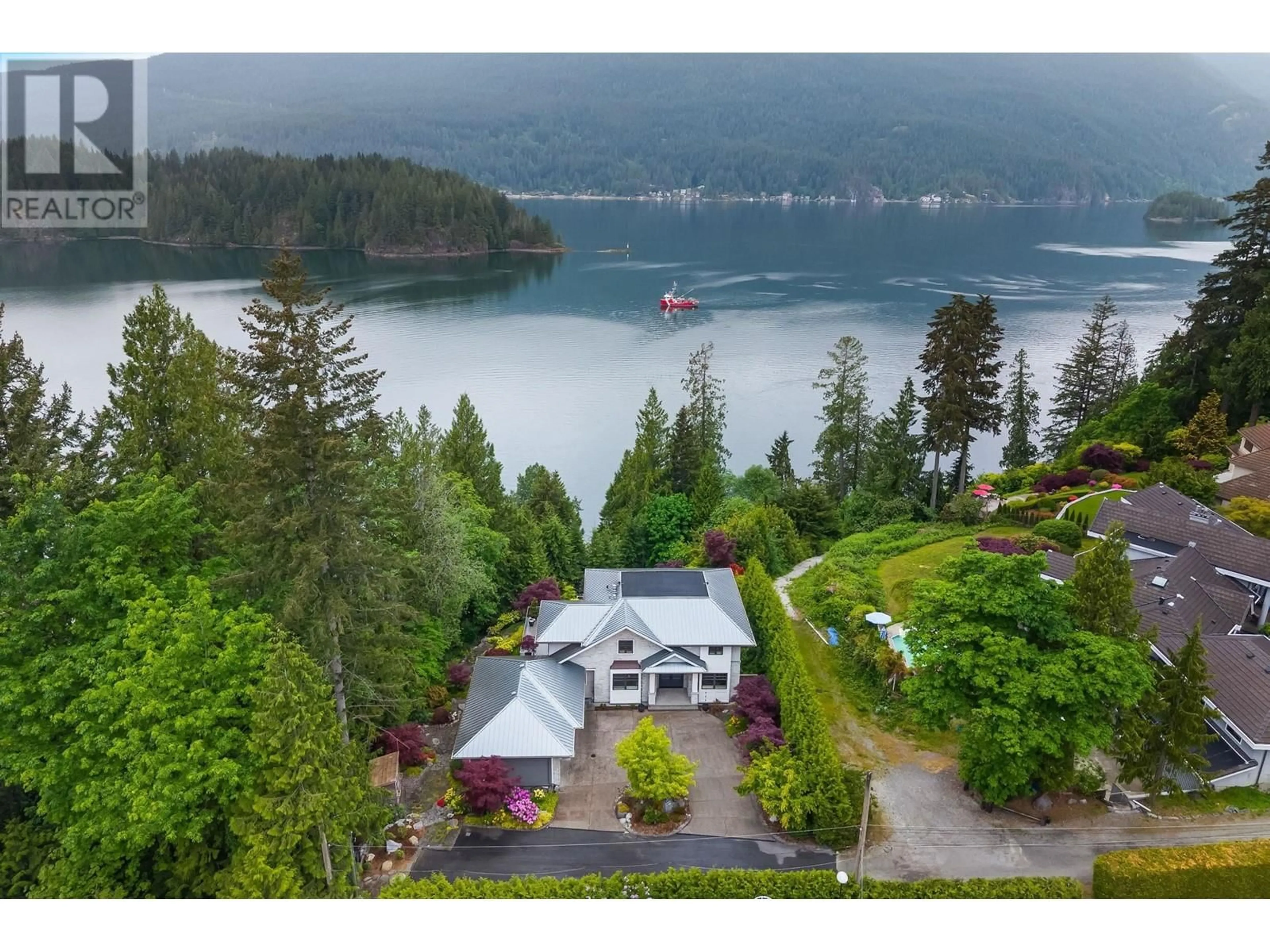A pic from outside/outdoor area/front of a property/back of a property/a pic from drone, water/lake/river/ocean view for 3377 SENKLER ROAD, Belcarra British Columbia V3H4S3