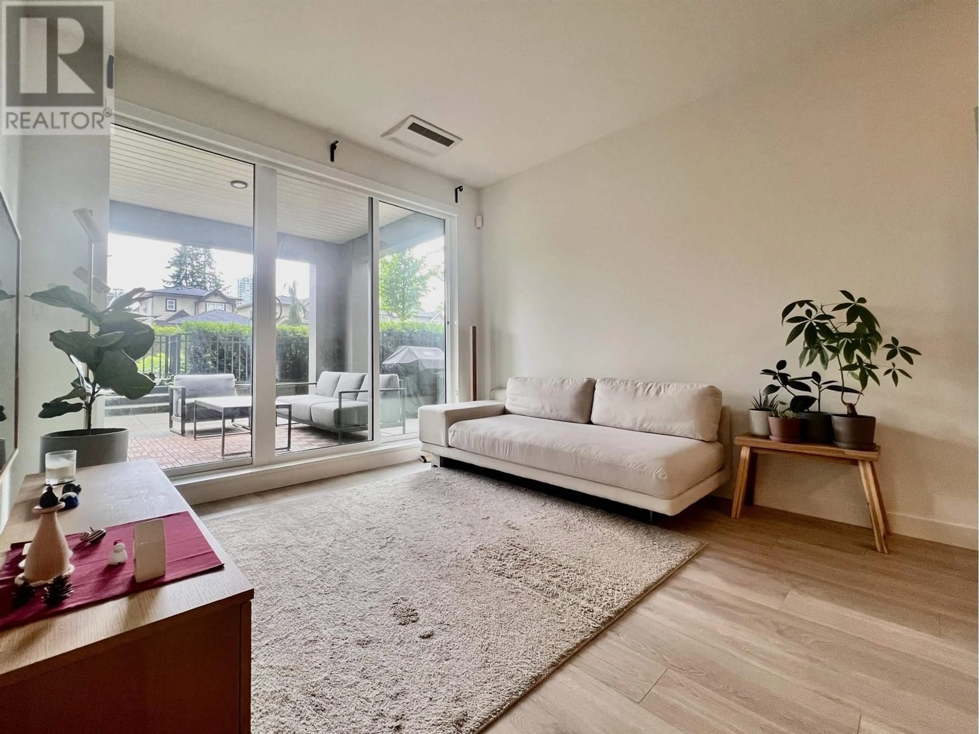Living room with furniture, unknown for 106 - 7588 16TH STREET, Burnaby British Columbia V3N0H8
