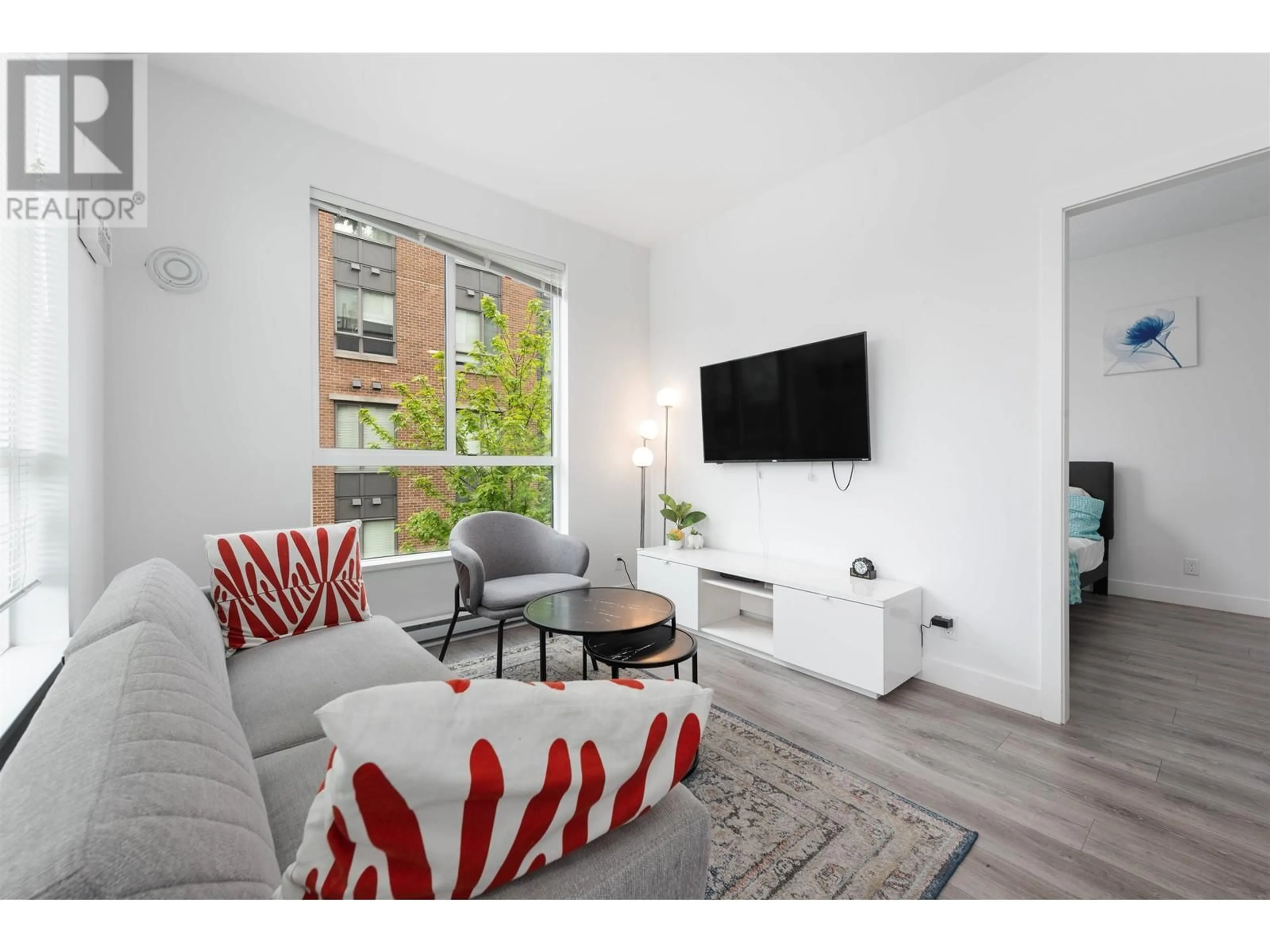 Living room with furniture, unknown for 313 - 700 CLARKE ROAD, Coquitlam British Columbia V3J0K5