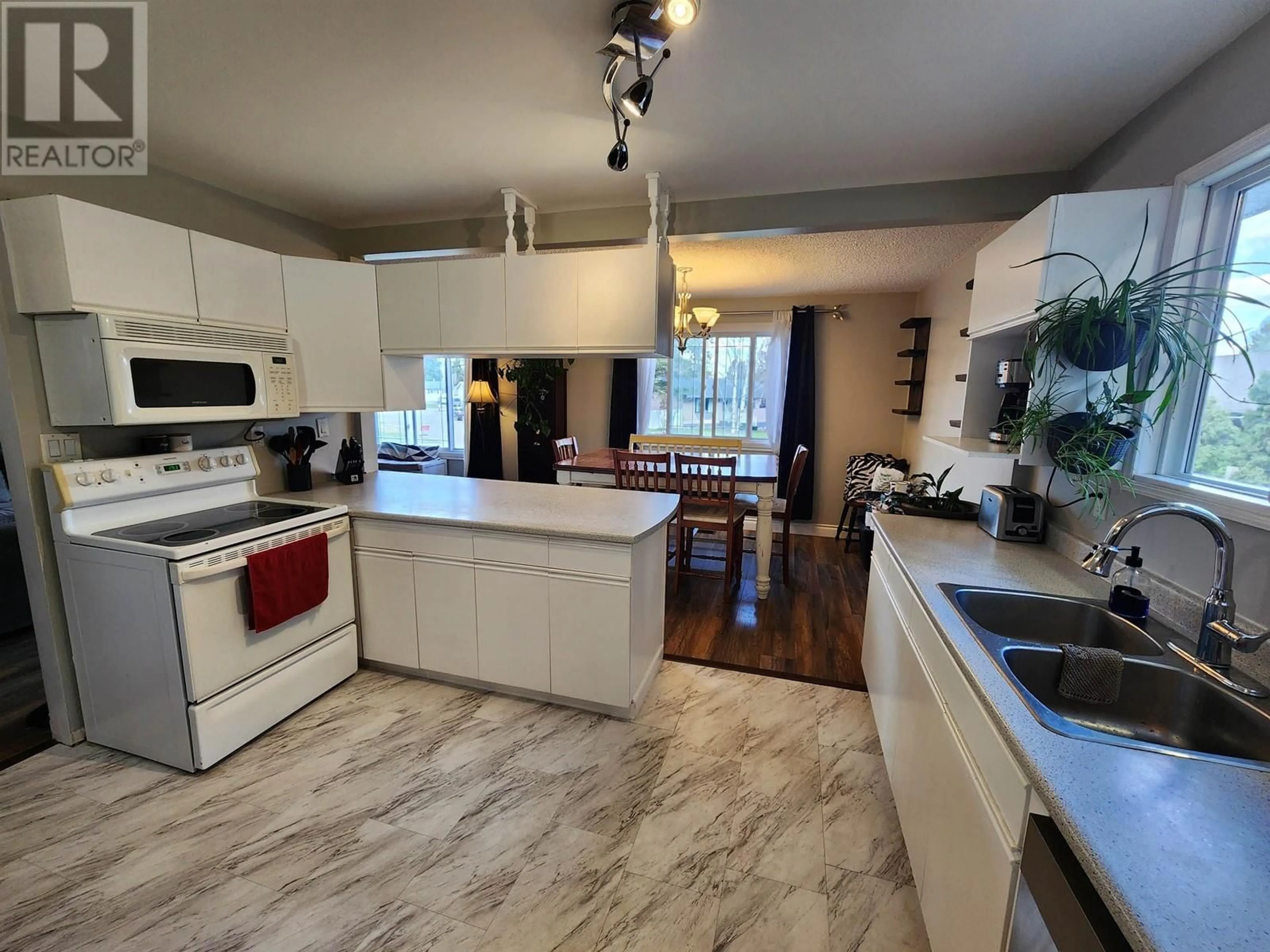Open concept kitchen, ceramic/tile floor for 6151 CALEDONIA CRESCENT, Prince George British Columbia V2N2H5