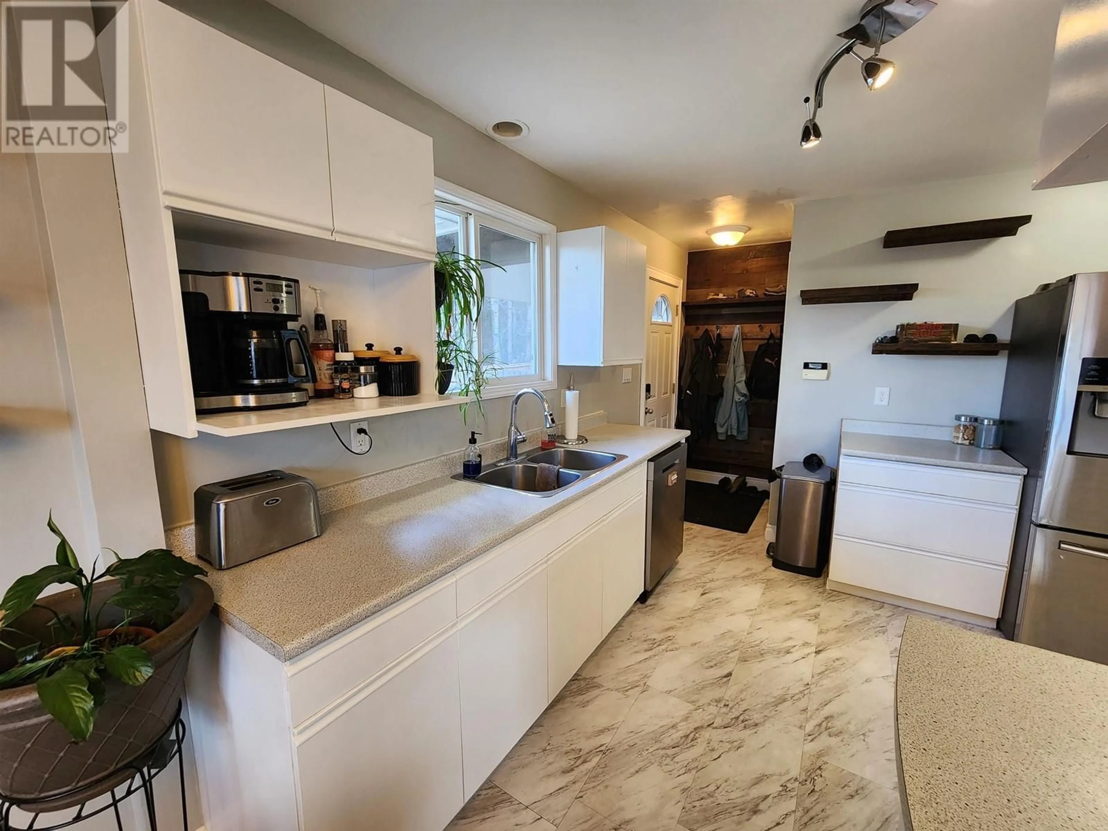 Open concept kitchen, ceramic/tile floor for 6151 CALEDONIA CRESCENT, Prince George British Columbia V2N2H5