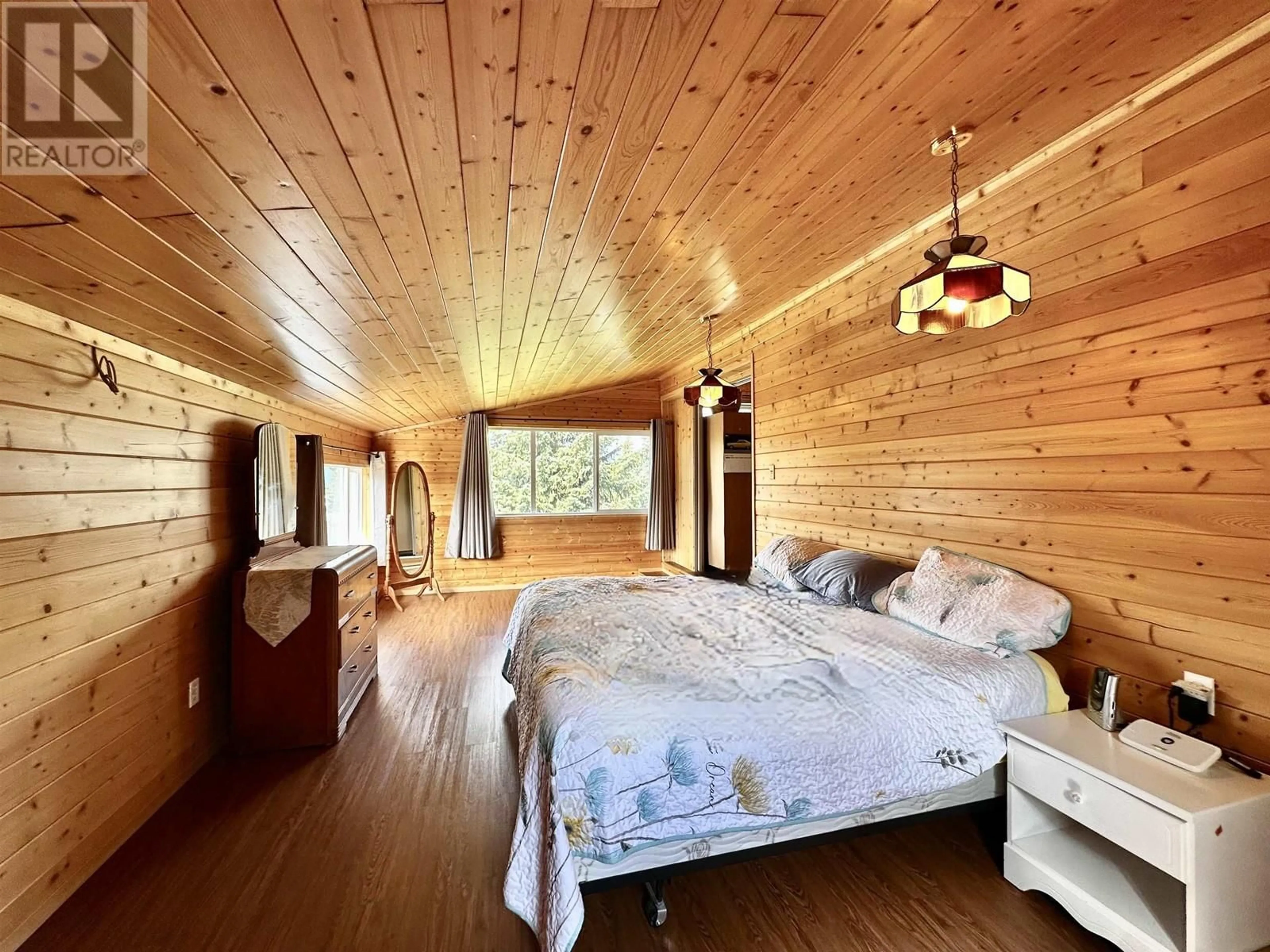 Bedroom with bed, wood/laminate floor for 2605 FIRST AVENUE, Terrace British Columbia V8G0G2