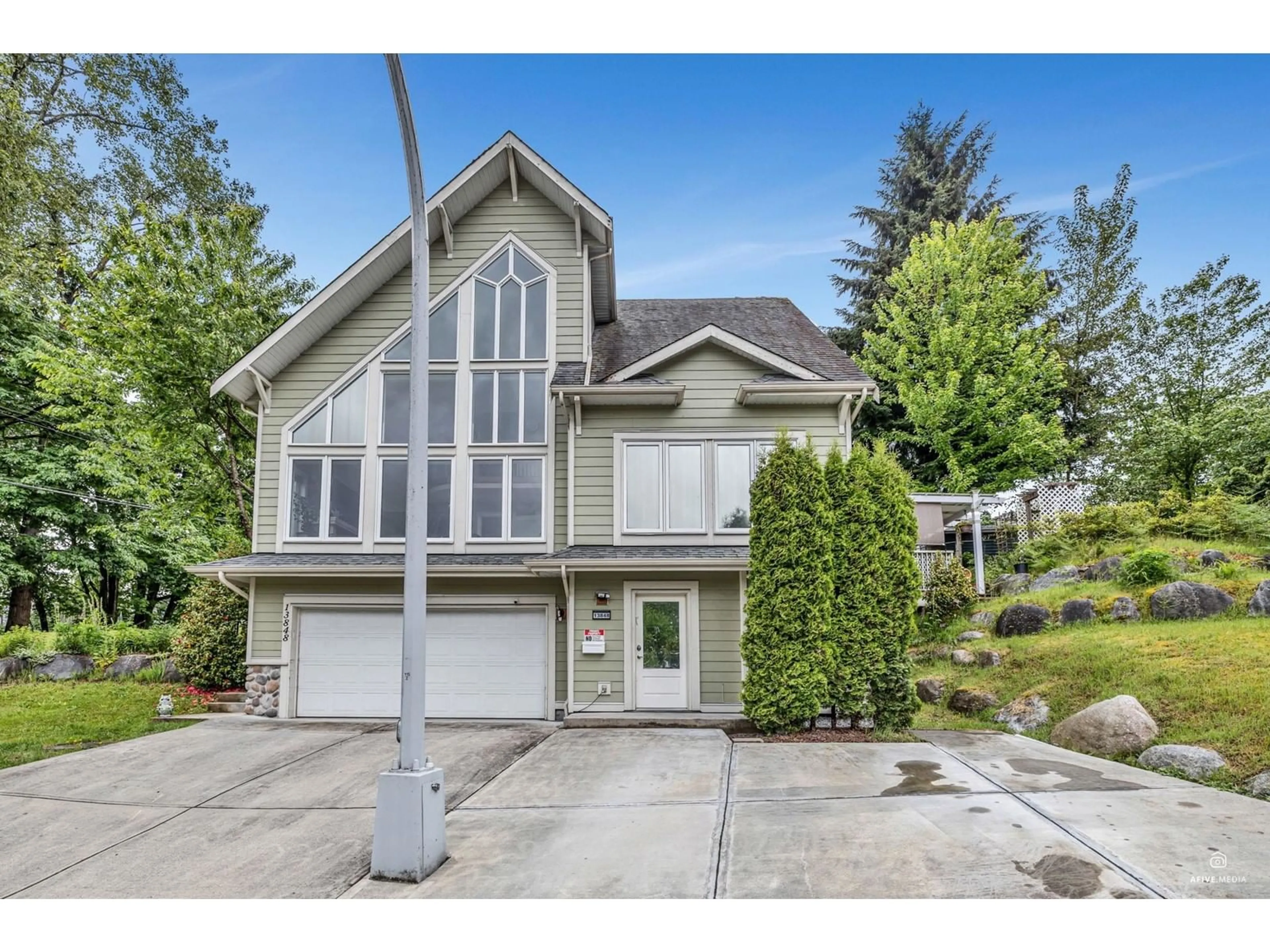 Home with vinyl exterior material, street for 13848 116, Surrey British Columbia V3R2T2