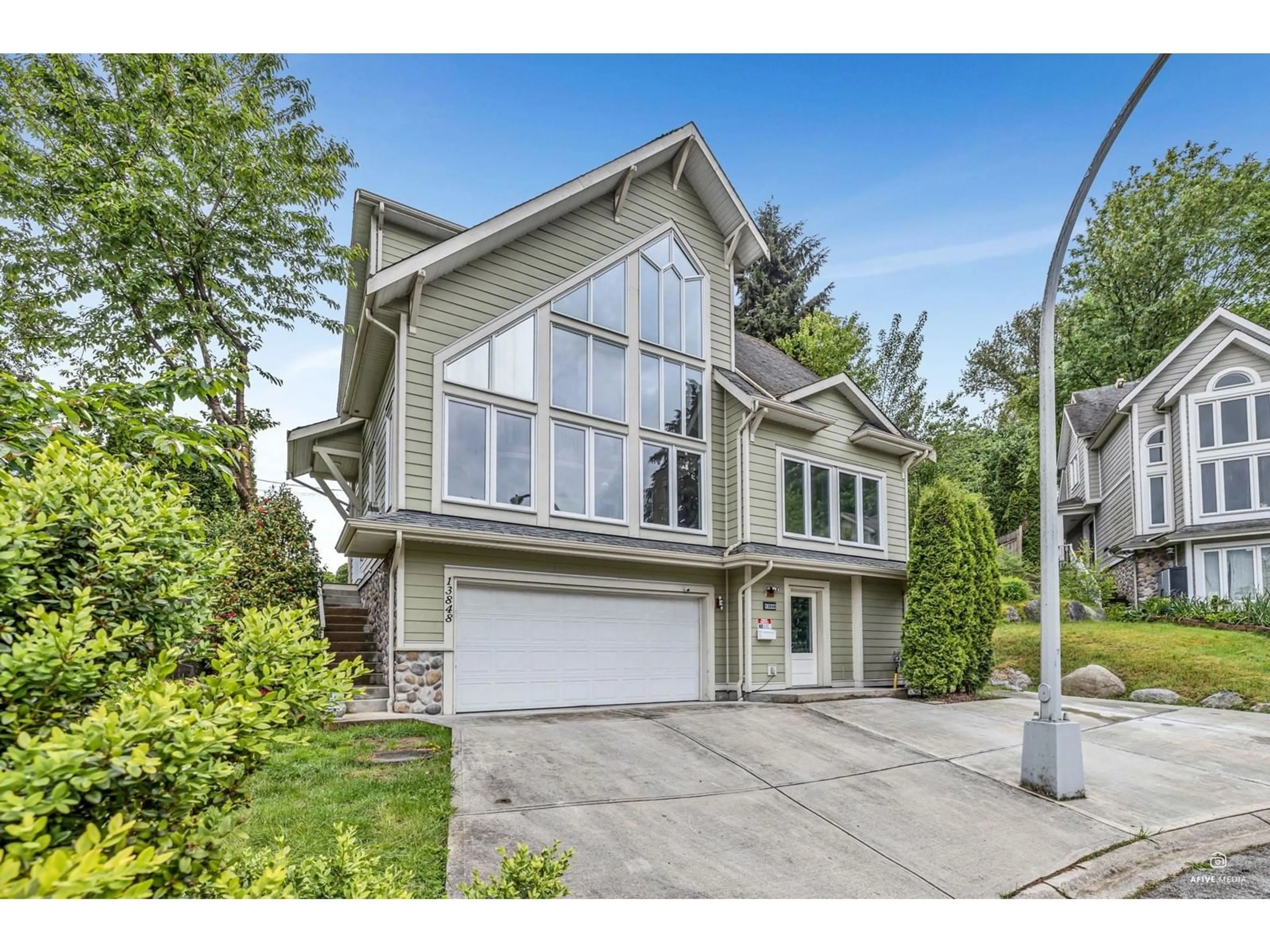 Home with vinyl exterior material, street for 13848 116, Surrey British Columbia V3R2T2