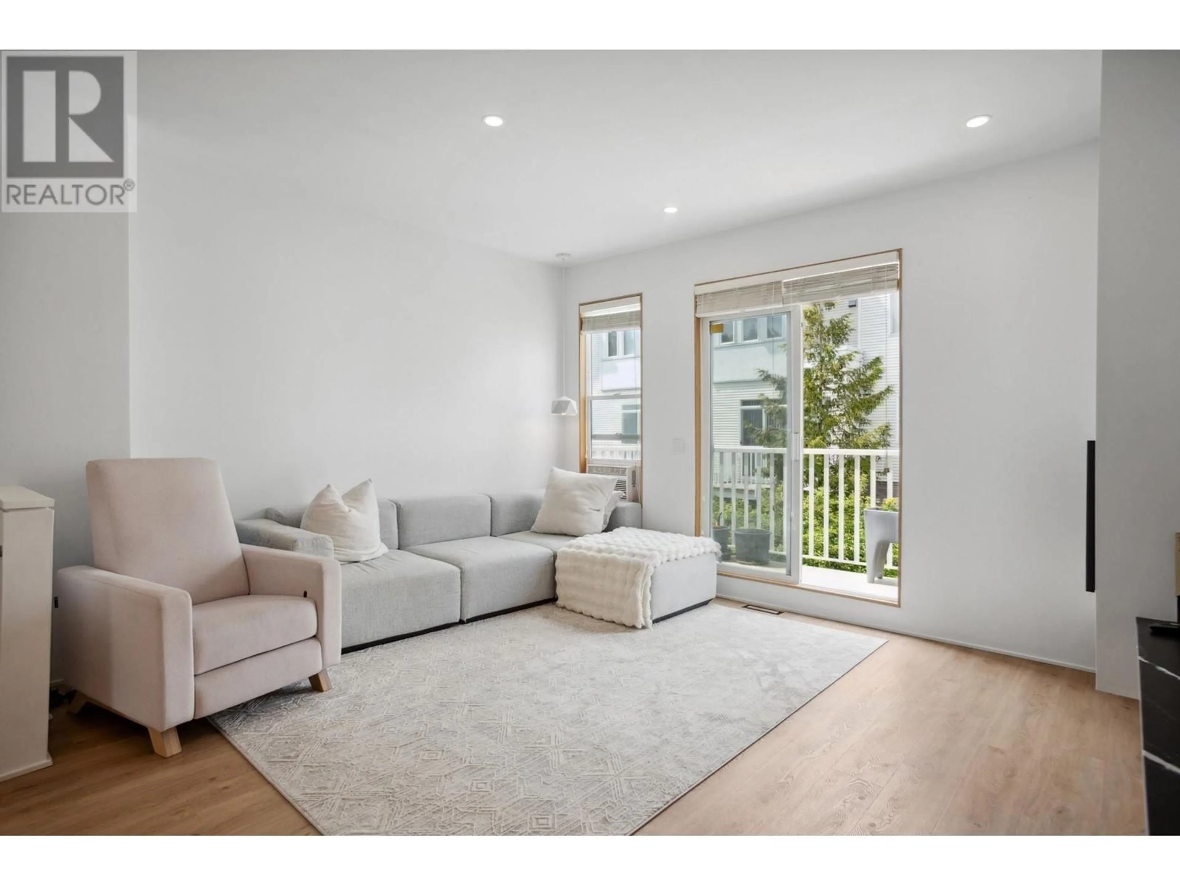 Living room with furniture, wood/laminate floor for 44 - 12331 MCNEELY DRIVE, Richmond British Columbia V6V2S3