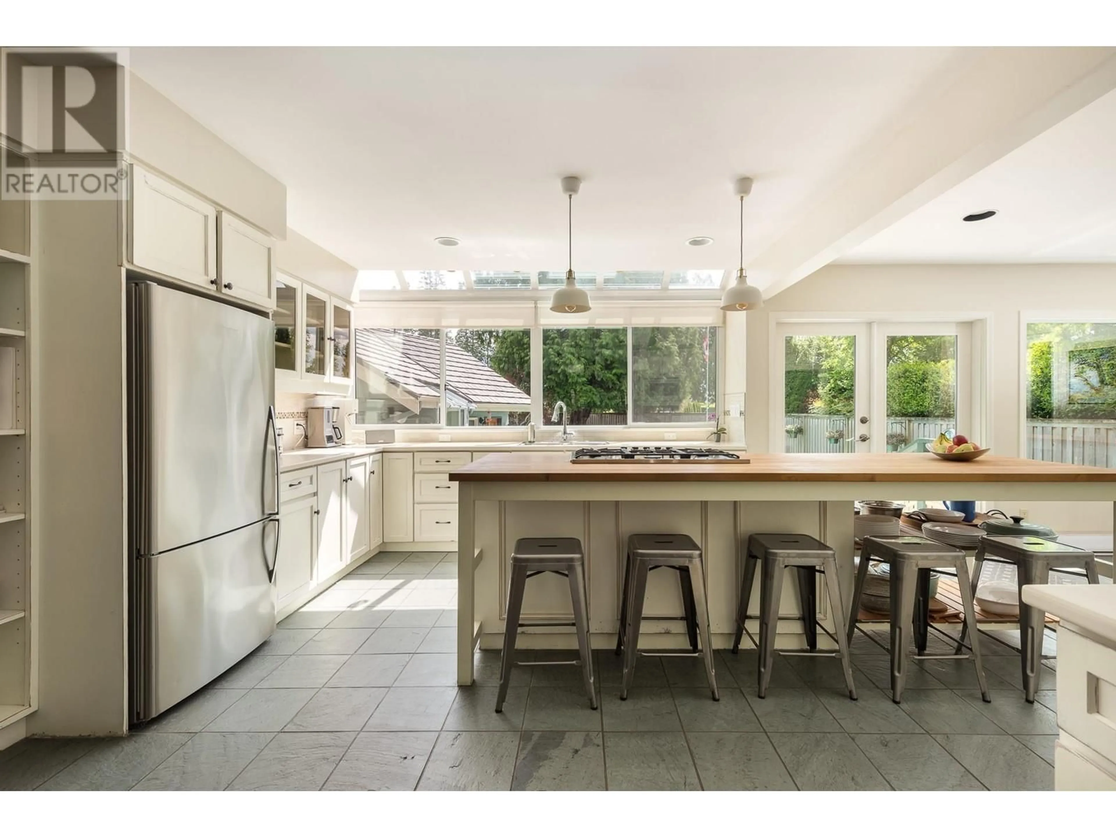 Open concept kitchen, ceramic/tile floor for 4399 ERWIN DRIVE, West Vancouver British Columbia V7V1H7