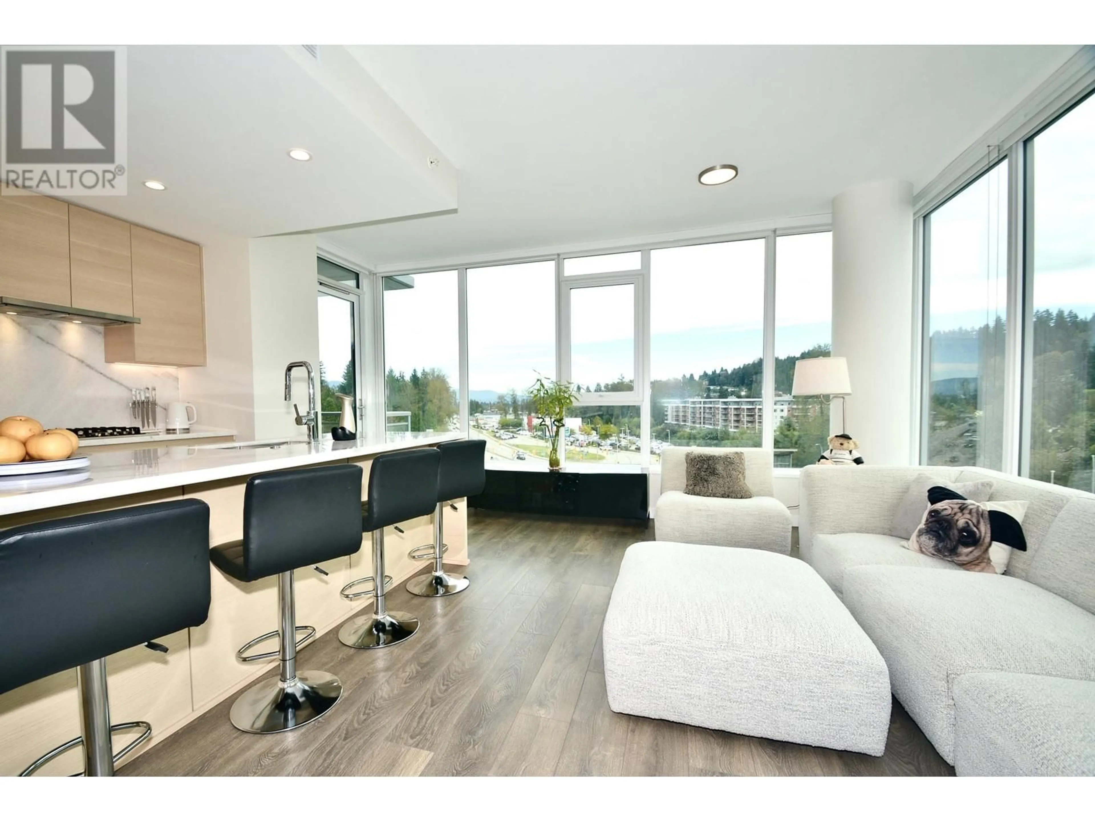 Living room with furniture, wood/laminate floor for 1104 - 308 MORRISSEY ROAD, Port Moody British Columbia V3H0M2