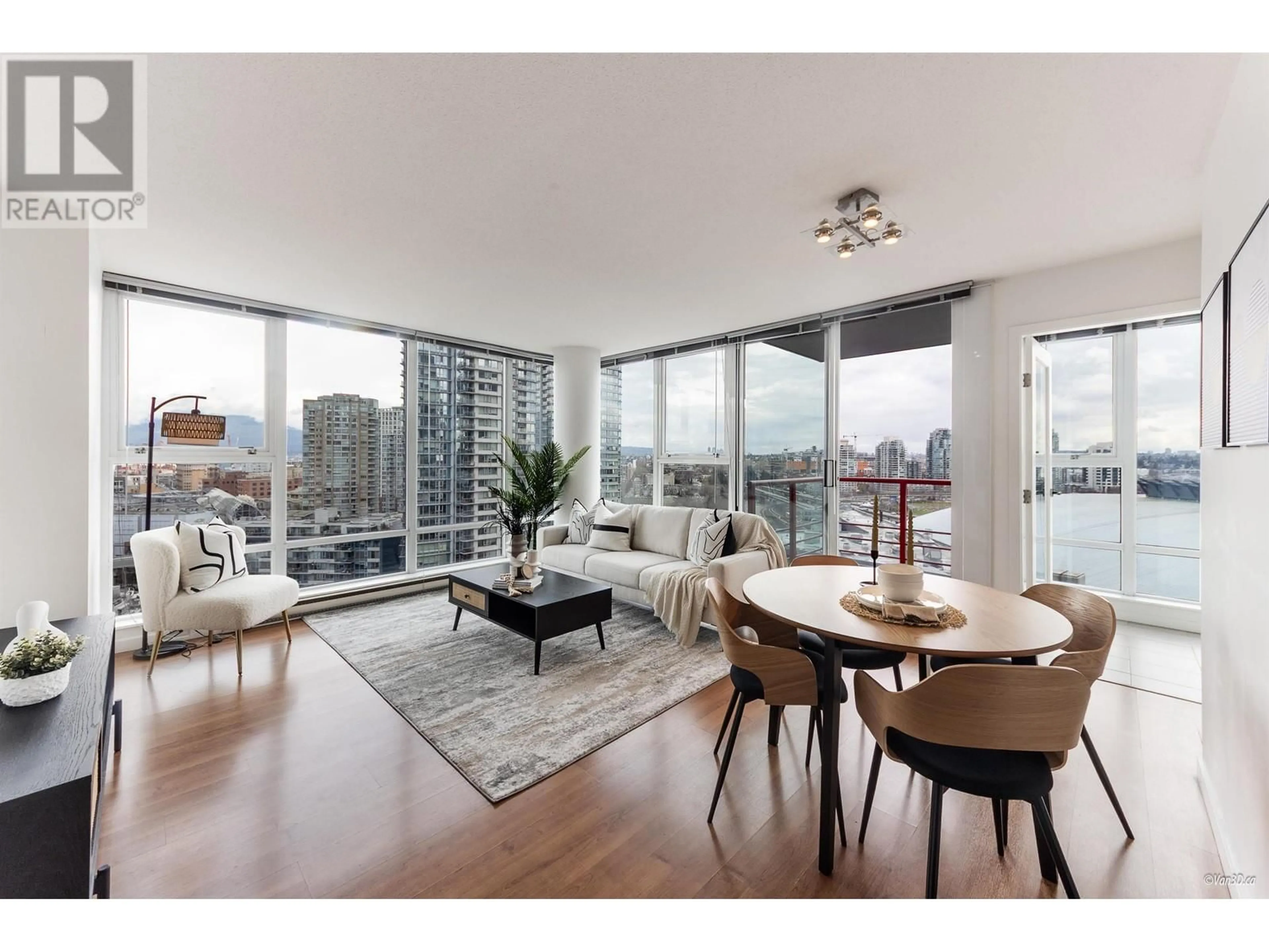 Living room with furniture, wood/laminate floor for 1202 - 131 REGIMENT SQUARE, Vancouver British Columbia V6B1X6
