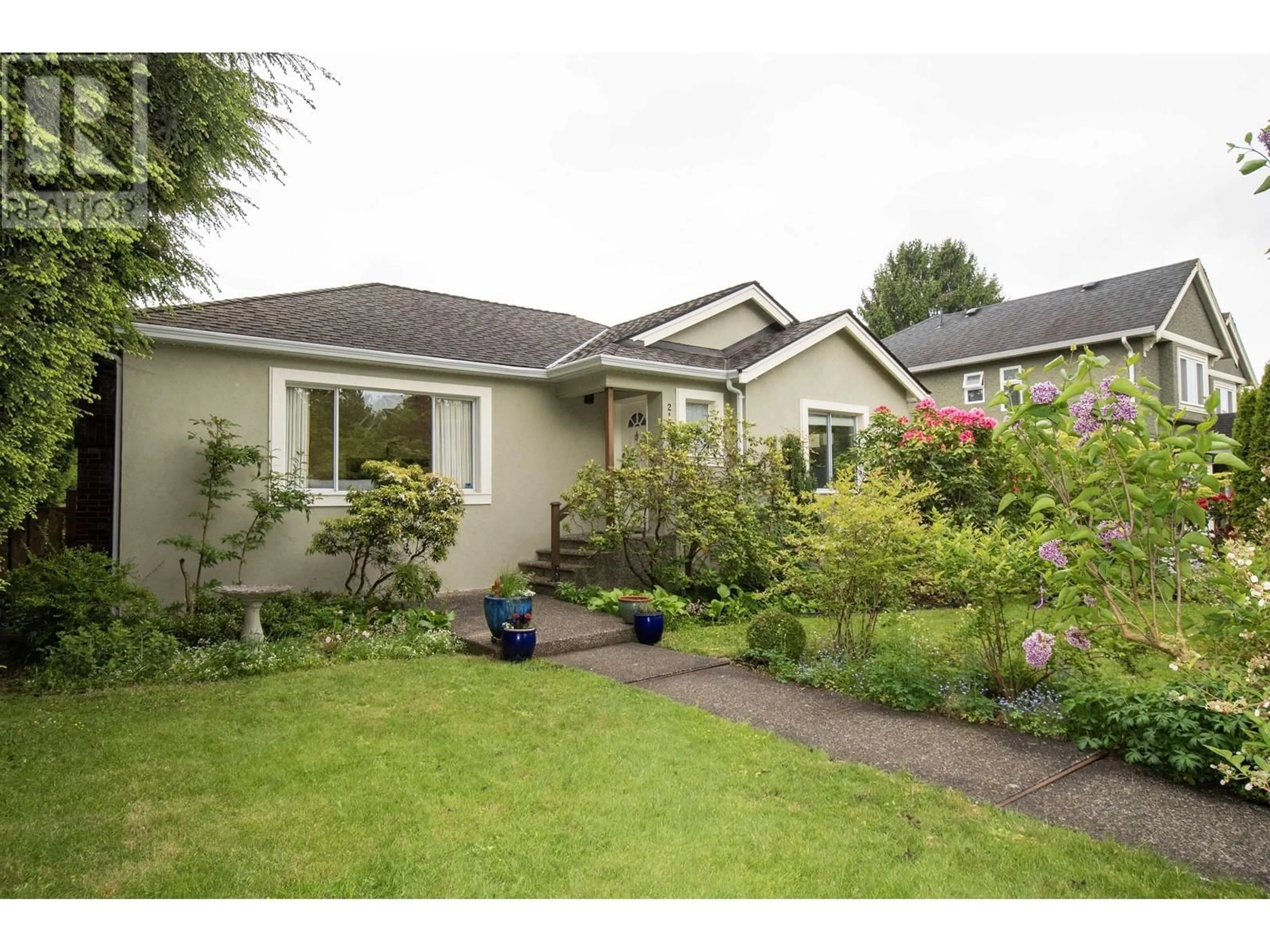 A pic from outside/outdoor area/front of a property/back of a property/a pic from drone, street for 2104 57TH AVENUE, Vancouver British Columbia V6P1V4