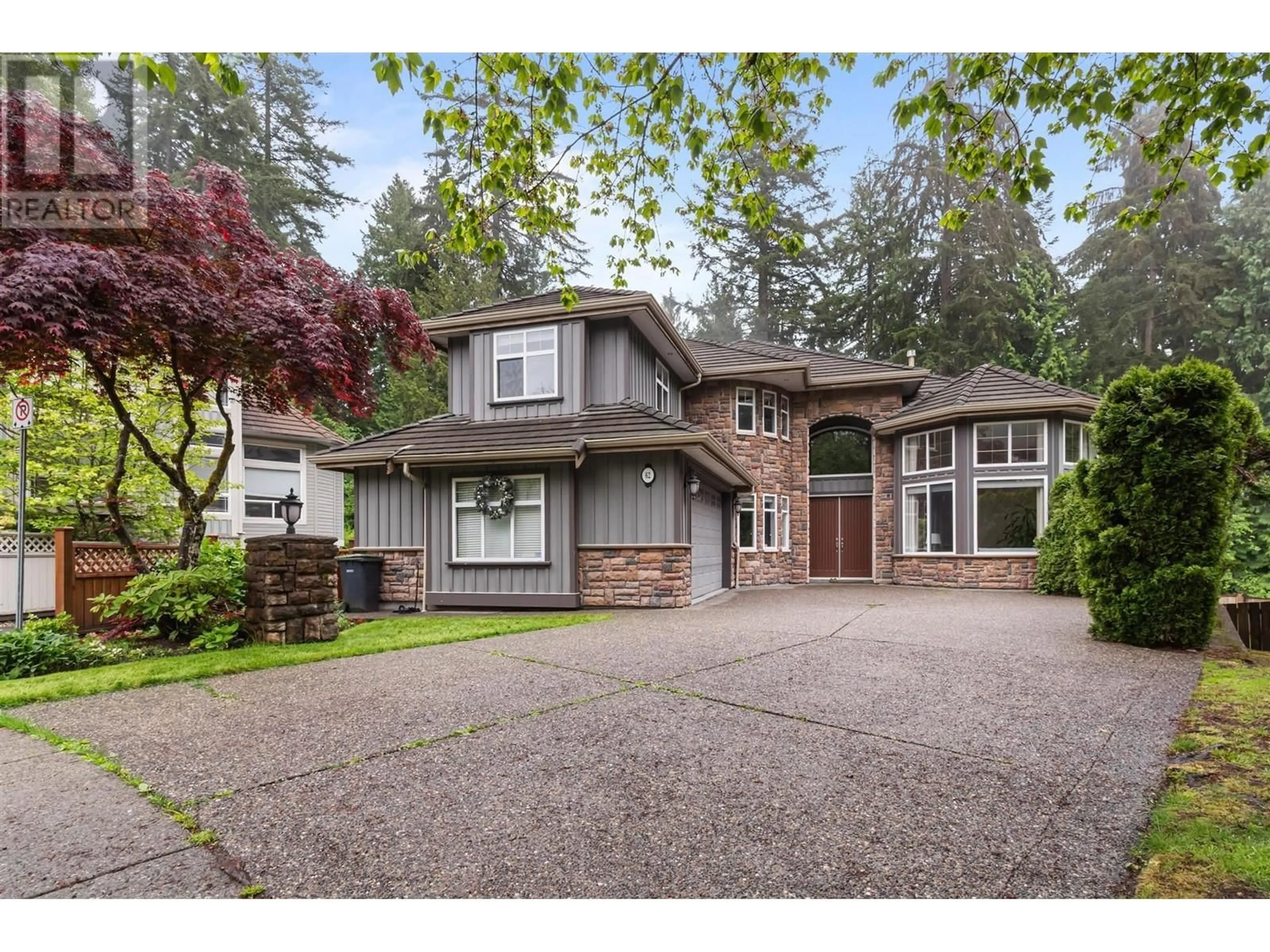 Home with vinyl exterior material, street for 62 EAGLE PASS, Port Moody British Columbia V3H5E7