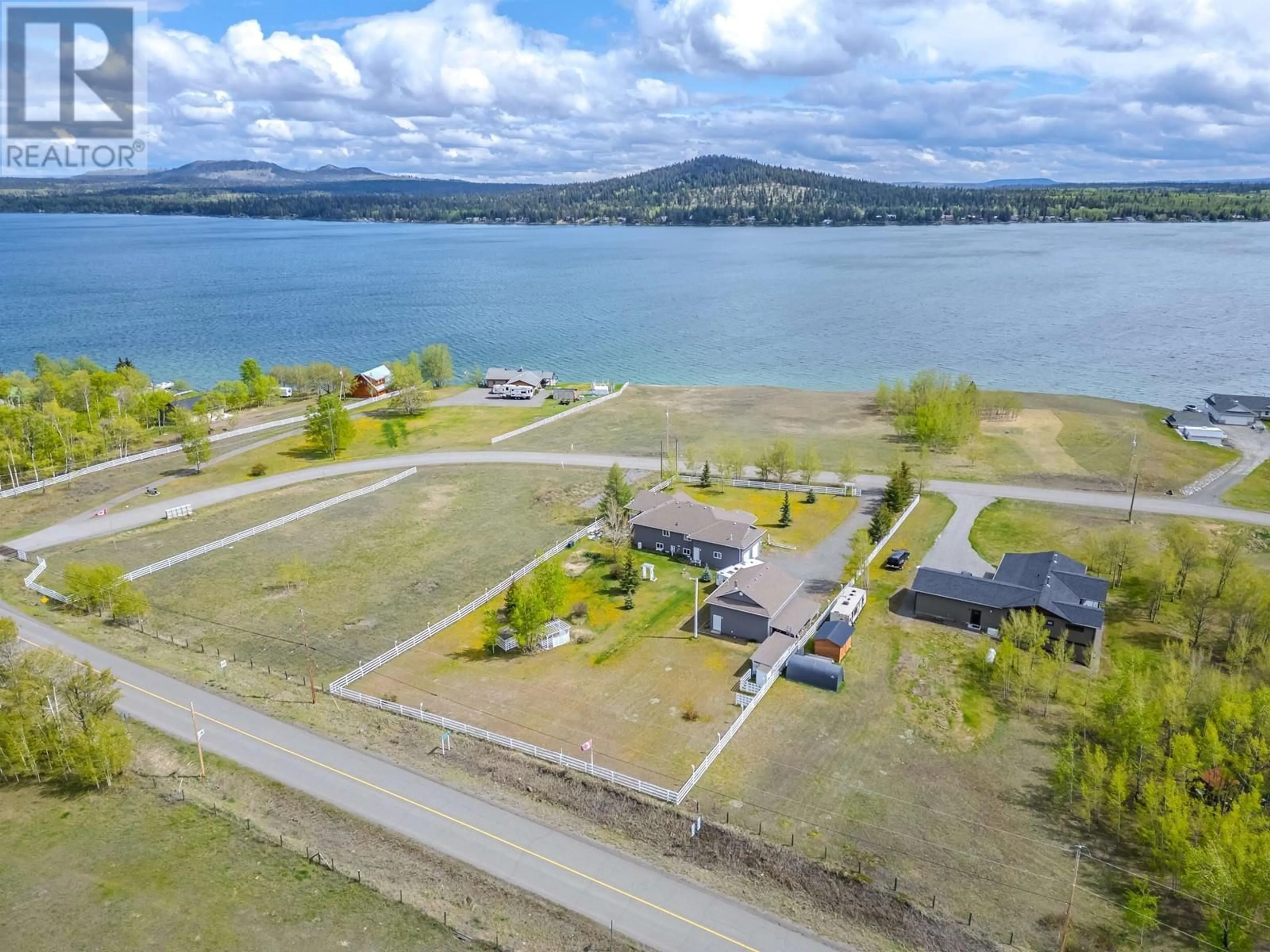 A pic from outside/outdoor area/front of a property/back of a property/a pic from drone, water/lake/river/ocean view for 8562 SKYLINE DRIVE, 70 Mile House British Columbia V0K2K1