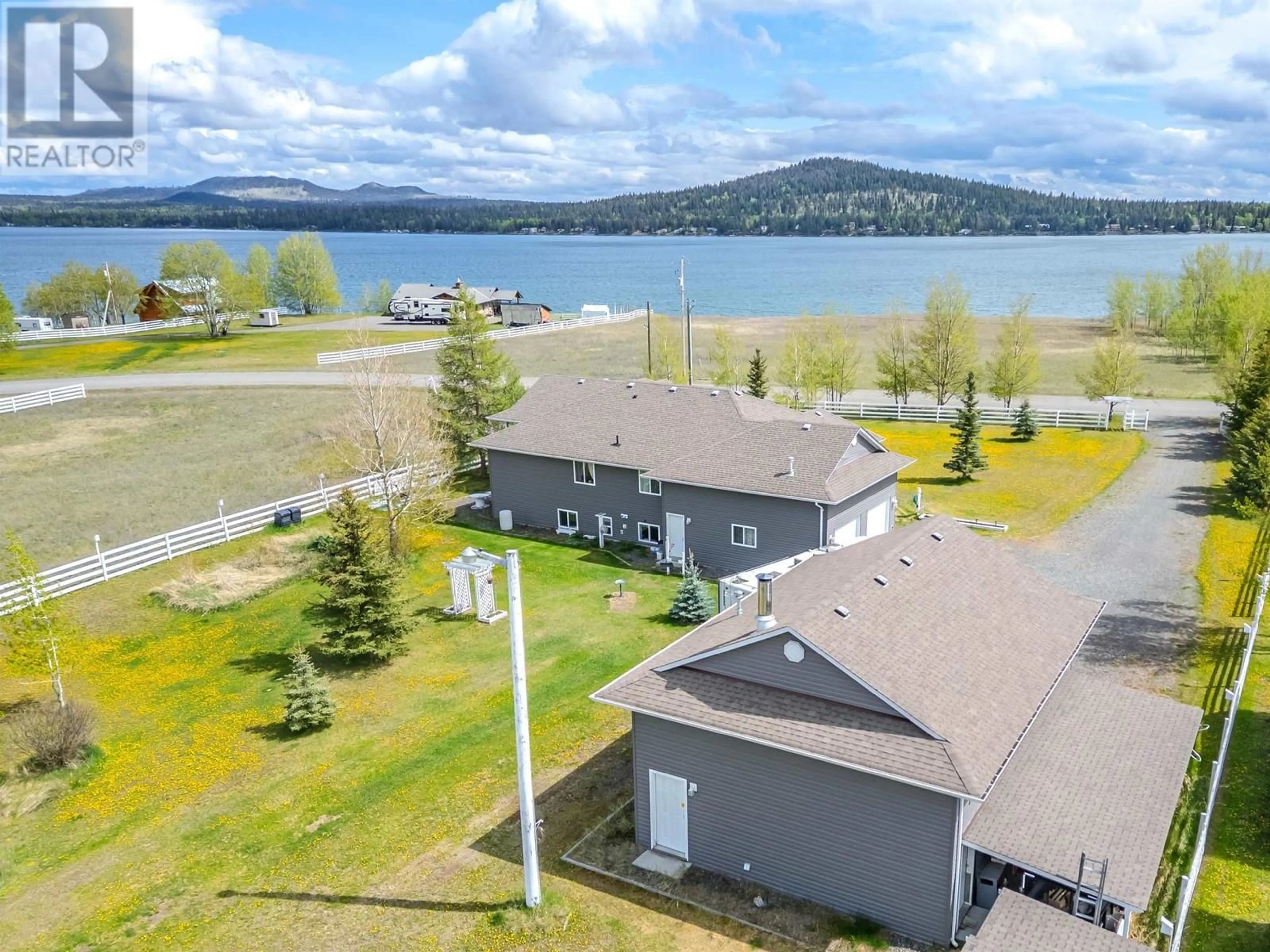 A pic from outside/outdoor area/front of a property/back of a property/a pic from drone, water/lake/river/ocean view for 8562 SKYLINE DRIVE, 70 Mile House British Columbia V0K2K1