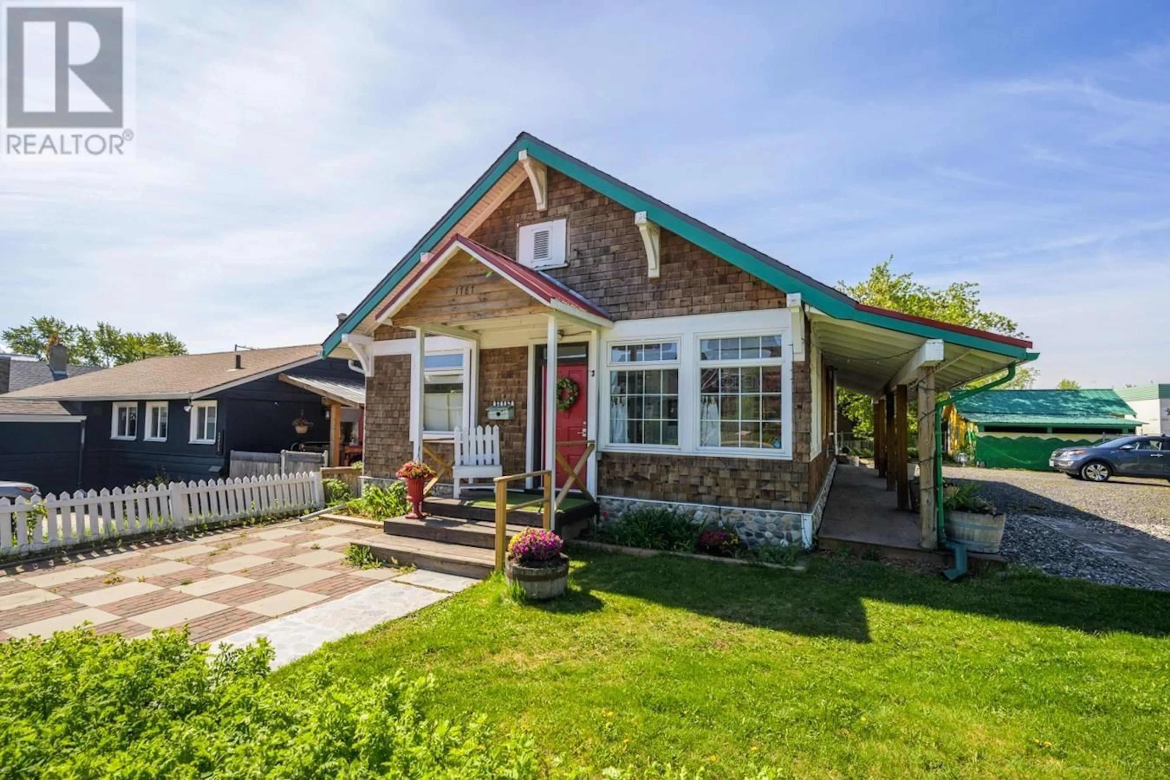 Home with brick exterior material, street for 1787 7TH AVENUE, Prince George British Columbia V2L3P7