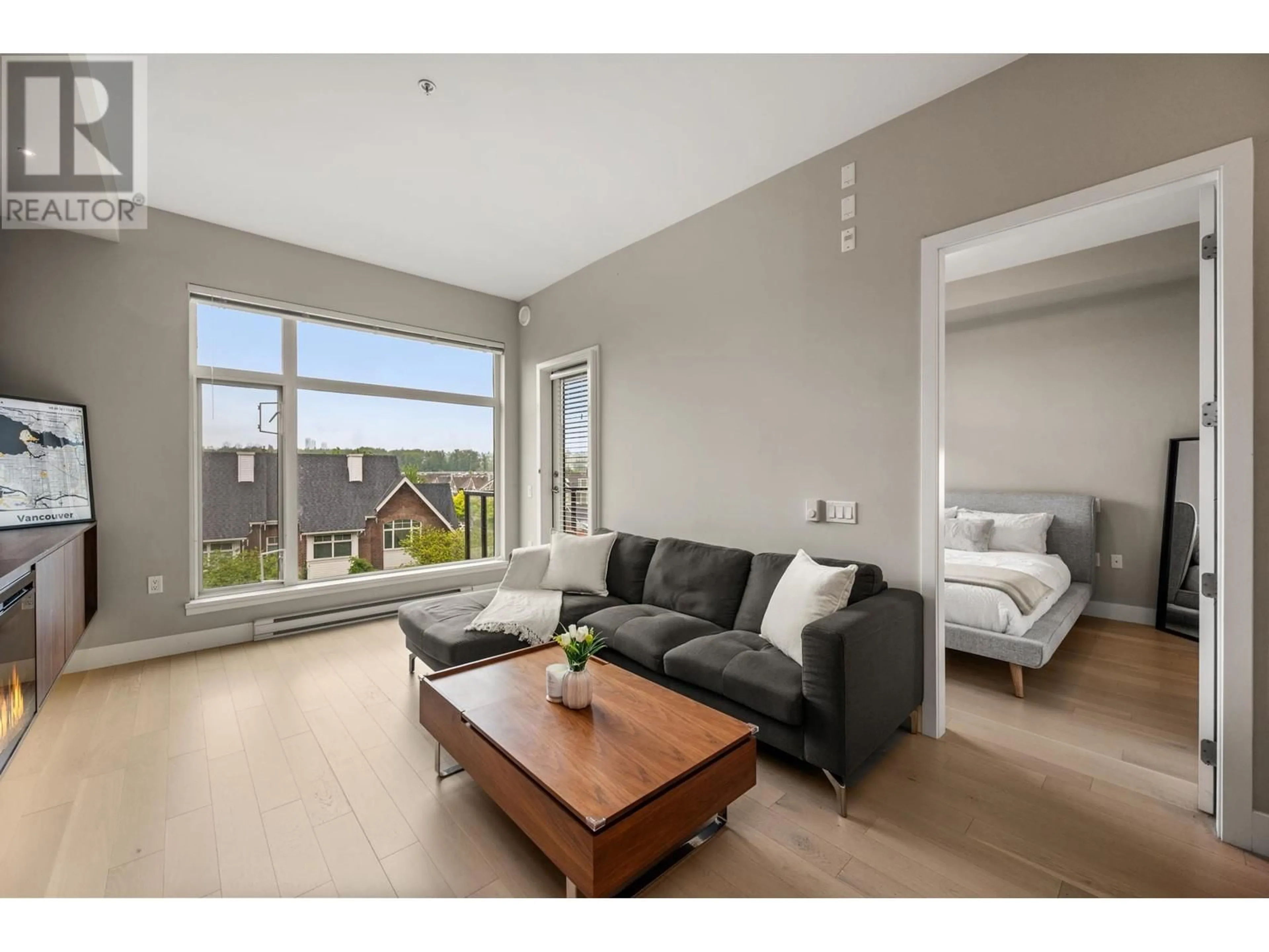 Living room with furniture, wood/laminate floor for 304 - 262 SALTER STREET, New Westminster British Columbia V3M0J6