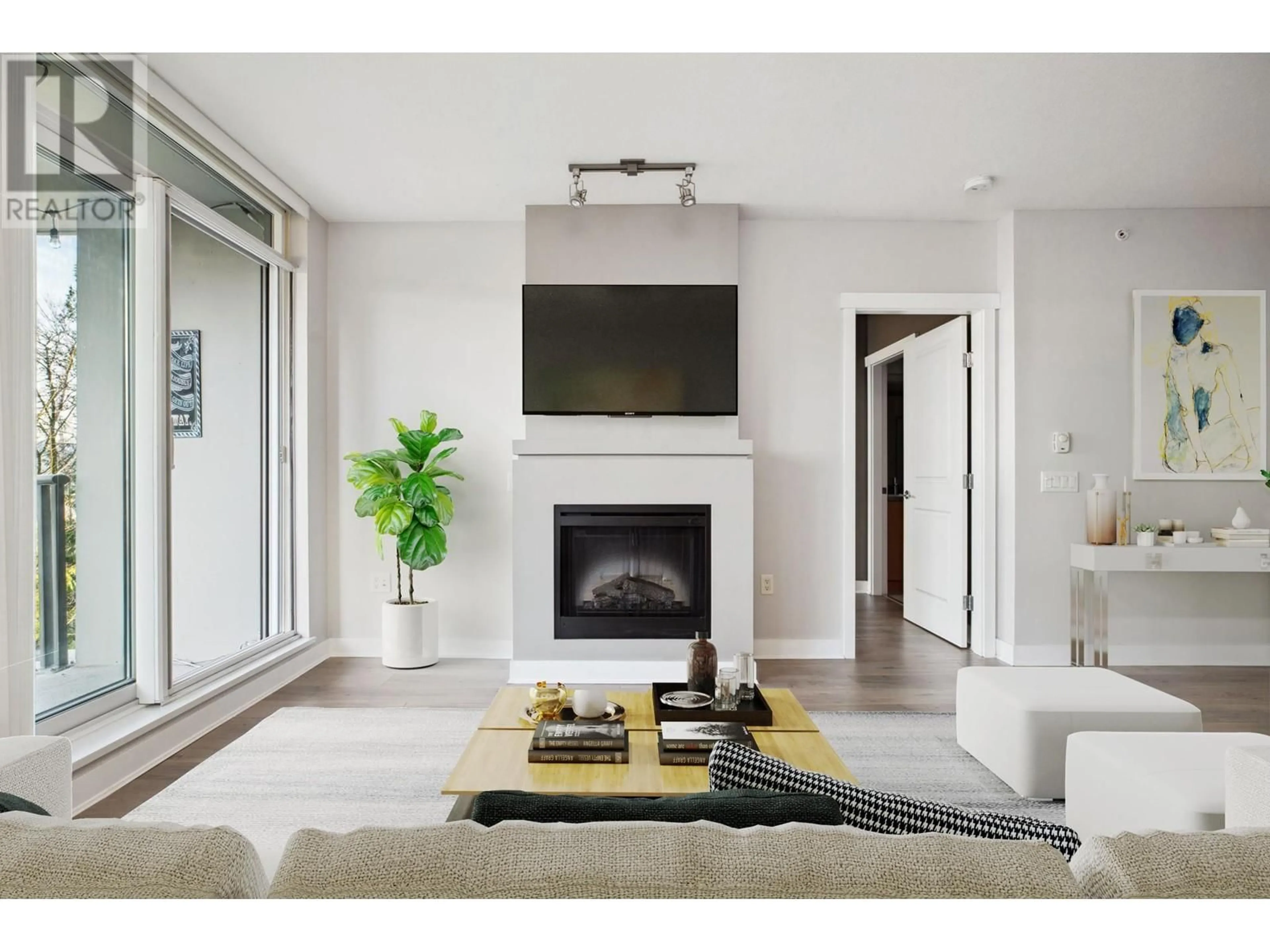 Living room with furniture, unknown for 202 - 9222 UNIVERSITY CRESCENT, Burnaby British Columbia V5A0A6