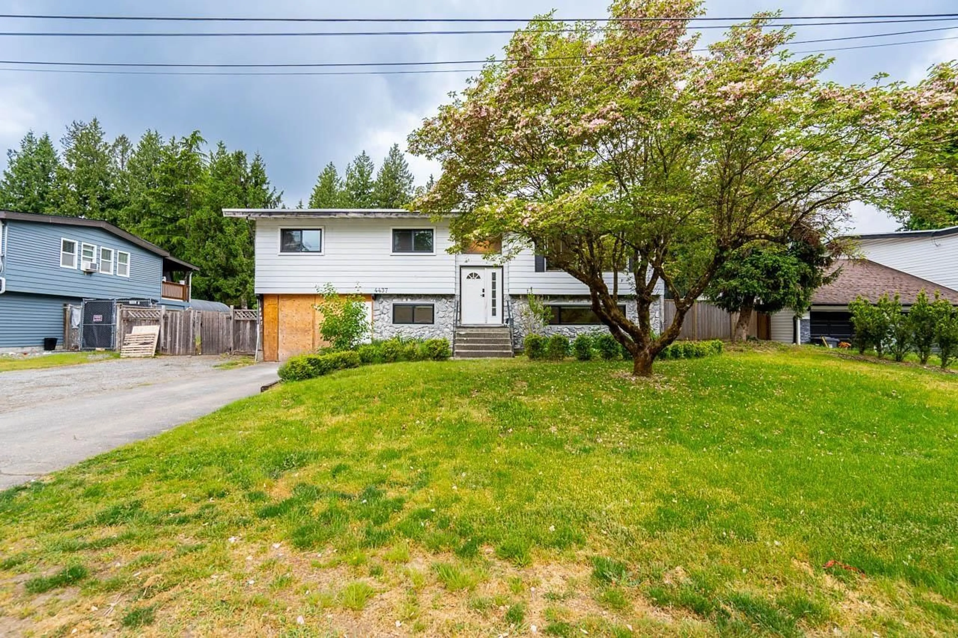 A pic from outside/outdoor area/front of a property/back of a property/a pic from drone, street for 4437 196A, Langley British Columbia V3A4W1